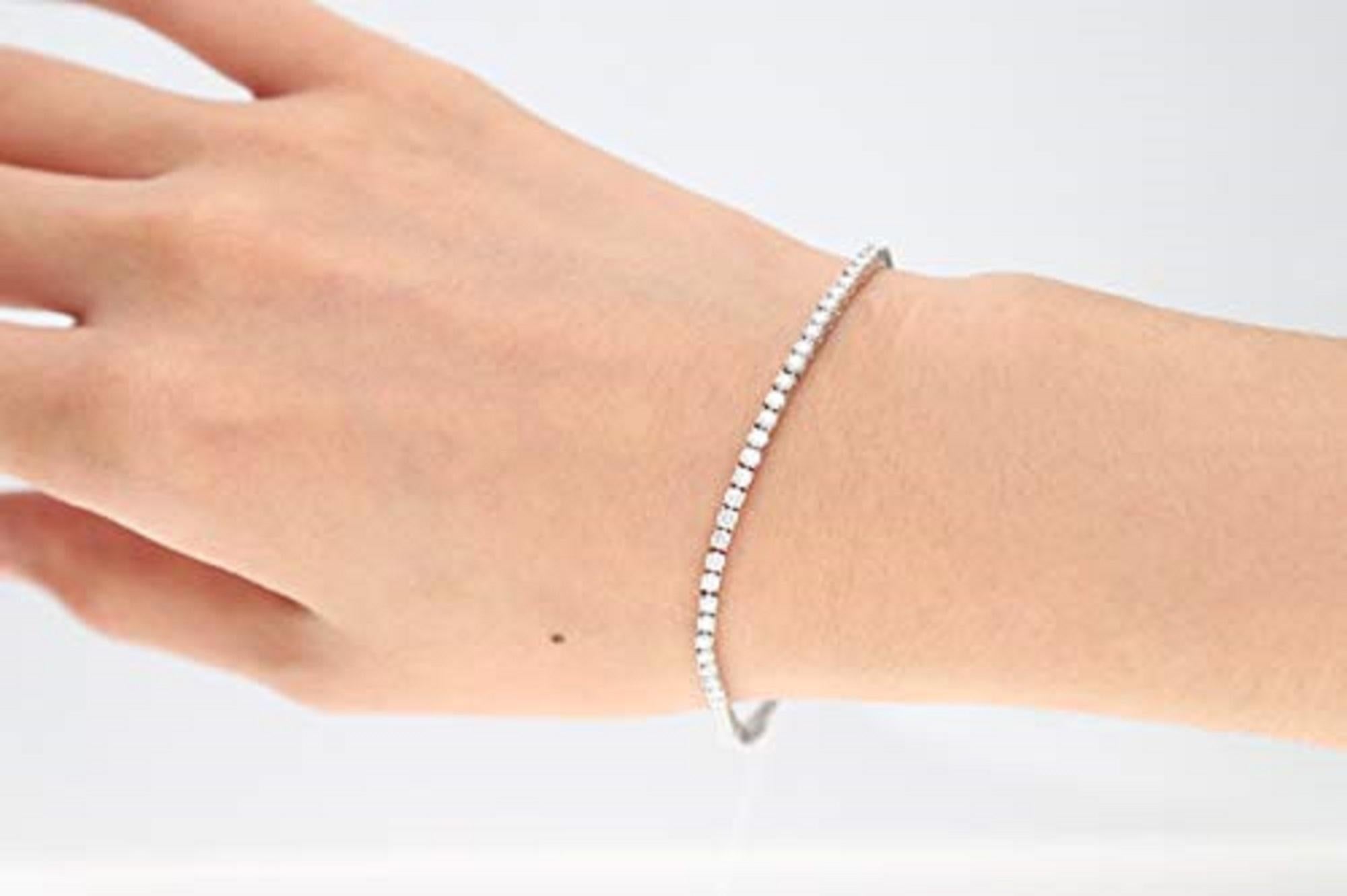 Stunning, timeless and classy eternity Unique Bracelet. Decorate yourself in luxury with this Gin & Grace Bracelet. The 14K White Gold jewelry boasts Round-Cut Prong Setting Natural White Diamond (78 pcs) 3.06 Carat accent stones for a lovely