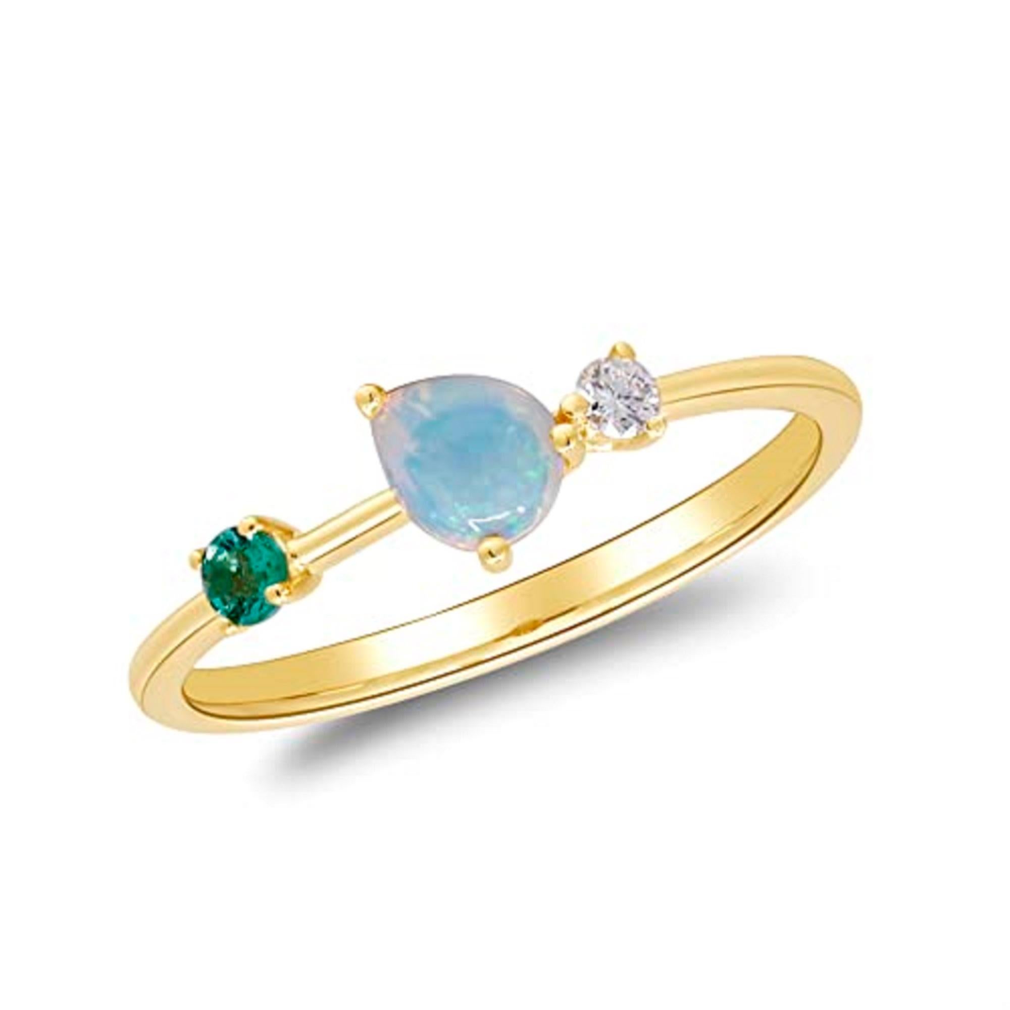 Decorate yourself in elegance with this Ring is crafted from 14-karat Yellow Gold by Gin & Grace. This Ring is made up of 4*5 (Pear-Cut) Ethiopian opal (1 pcs) 0.20 carat, 2.5mm round-cut Emerald (1 Pcs) 0.06 carat and Round-cut white diamond (1