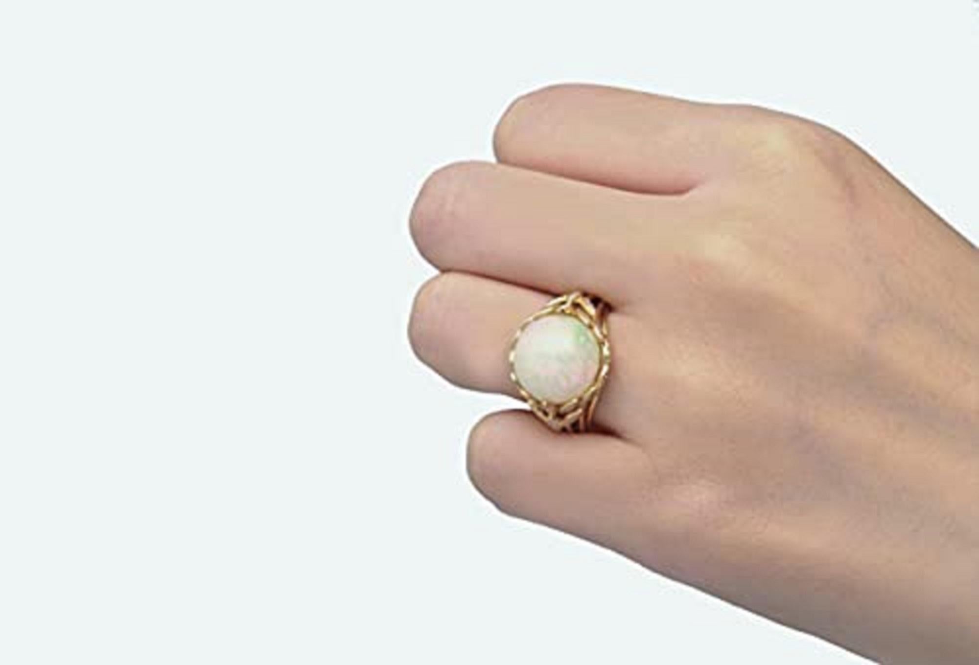 Perfect for your jewelry collection, the Ring showcases an ornate design by Gin & Grace. This Ring is made up of 14K Yellow gold is polished and showcases ideal Natural Mexican Fire Opel gemstones (1 Pc) 5.49 Carat Cushion-Cut Prong Setting and