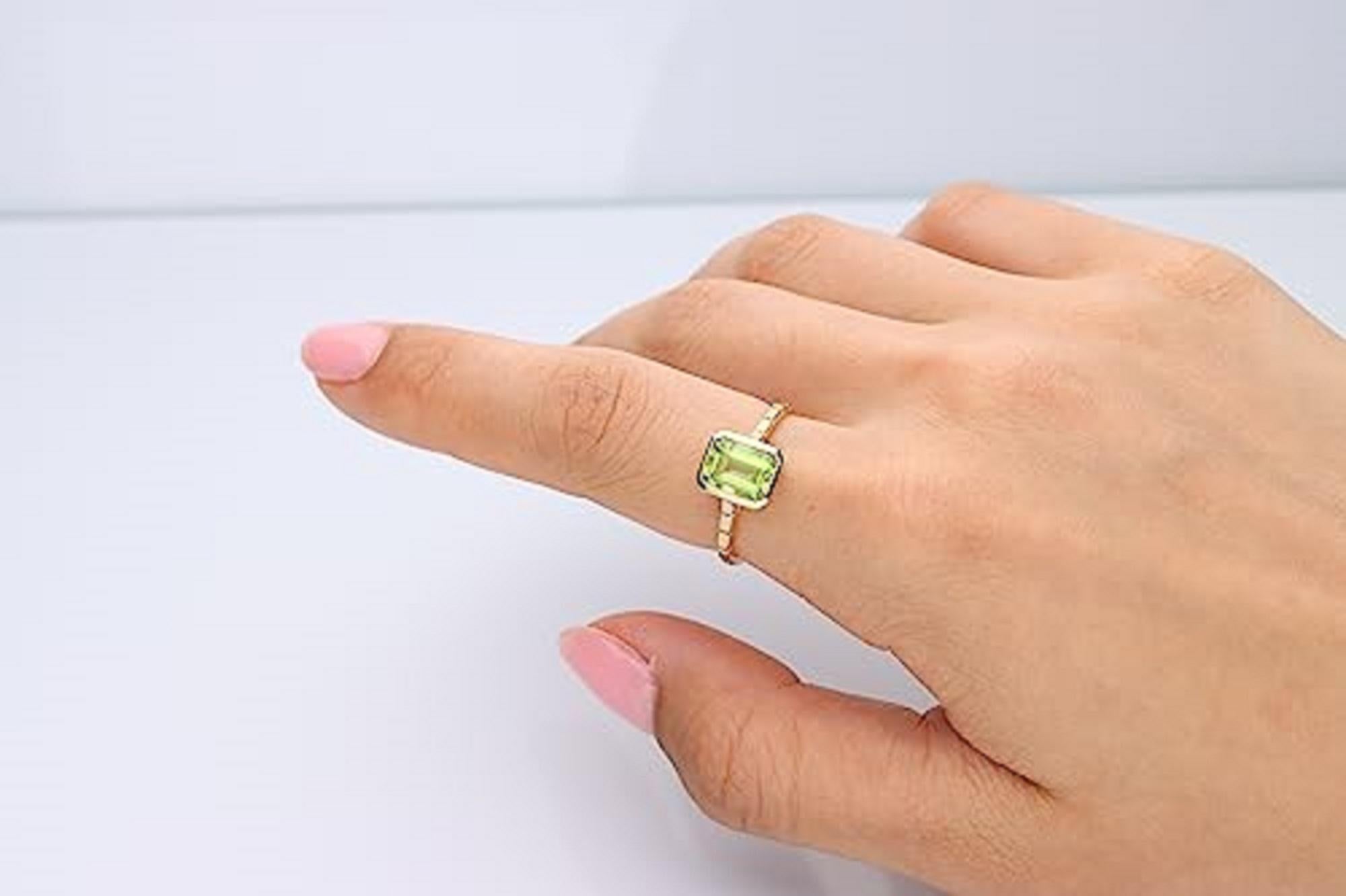 Decorate yourself in elegance with this Ring is crafted from 14-karat Yellow gold 6*8 Emerald-Cut Peridot (1 pcs) 1.64 carat. This Ring is weight 2.23 grams. This delicate Ring is polished to a high finish shine.