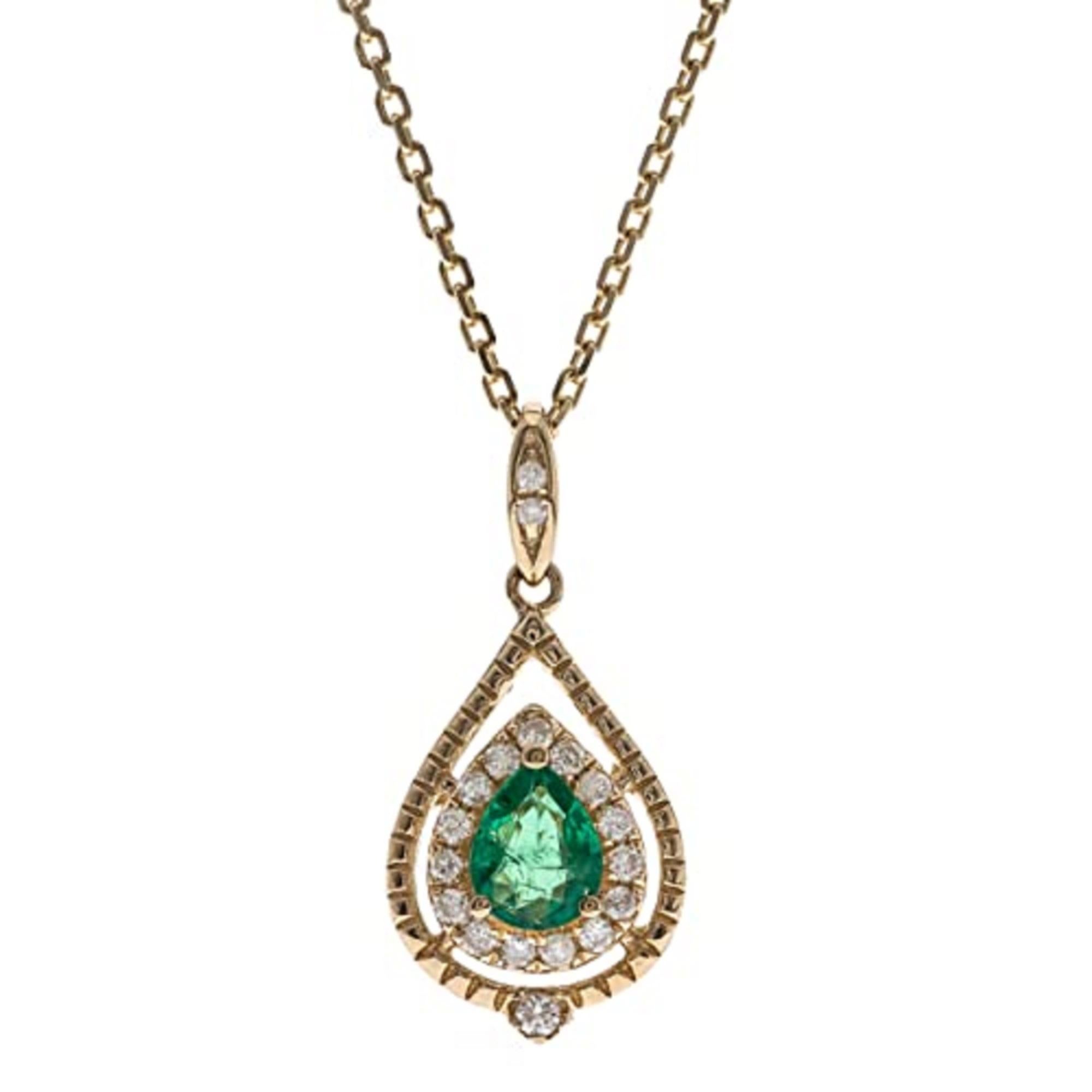 Decorate yourself in elegance with this Pendant is crafted from 14-karat Yellow Gold by Gin & Grace Pendant. This Pendant is made up of 4*5 Pear-cut Prong setting Emerald (1 Pcs) 0.26 Carat and Round-Cut White Diamond (20 Pcs) 0.26 Carat. This