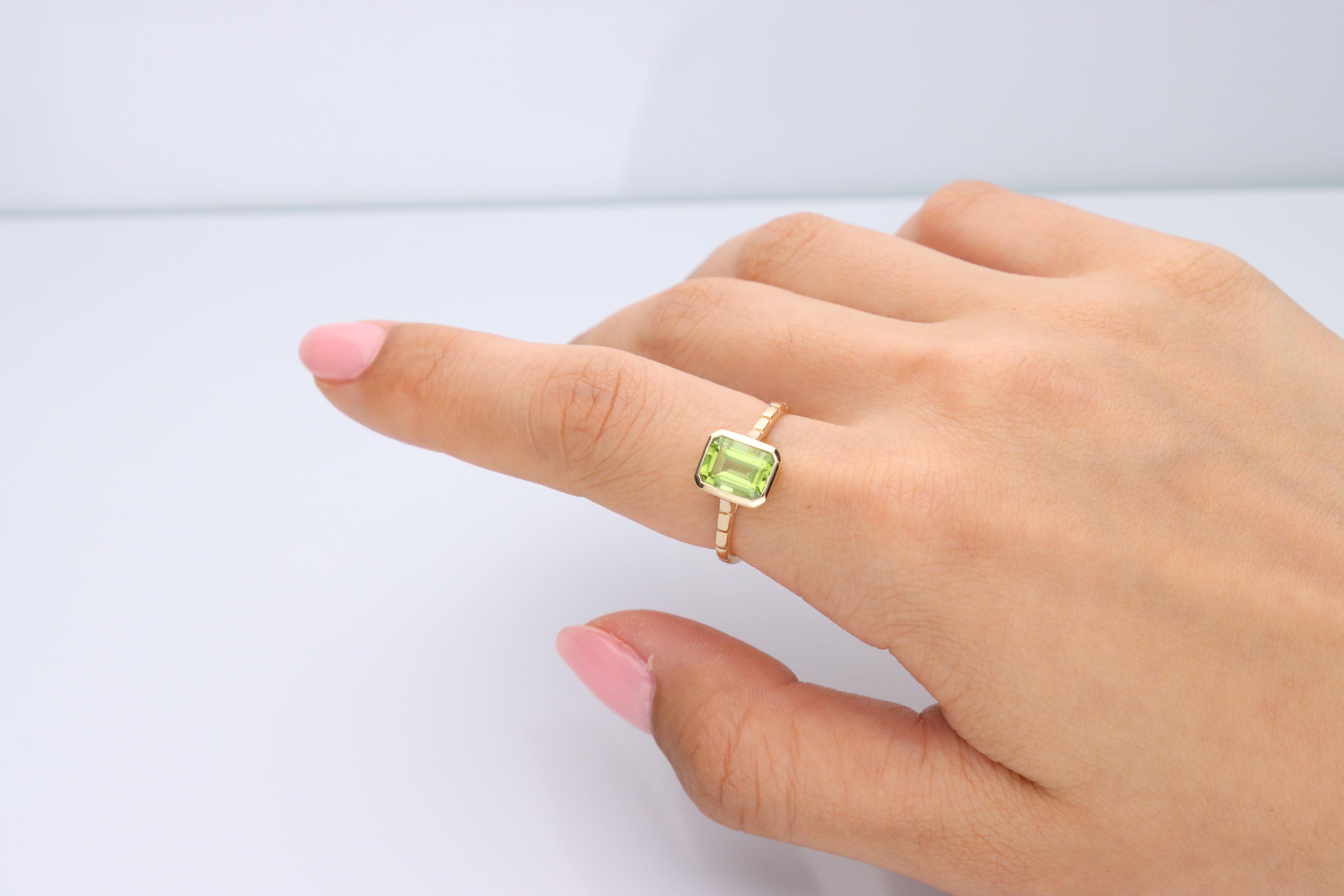 Stunning, timeless and classy eternity Unique Ring. Decorate yourself in luxury with this Gin & Grace Ring. The 14K Yellow Gold jewelry boasts with Emerald-Cut Peridot (1 pcs) 1.64 carat accent stones for a lovely design. This Ring is weight 2.23