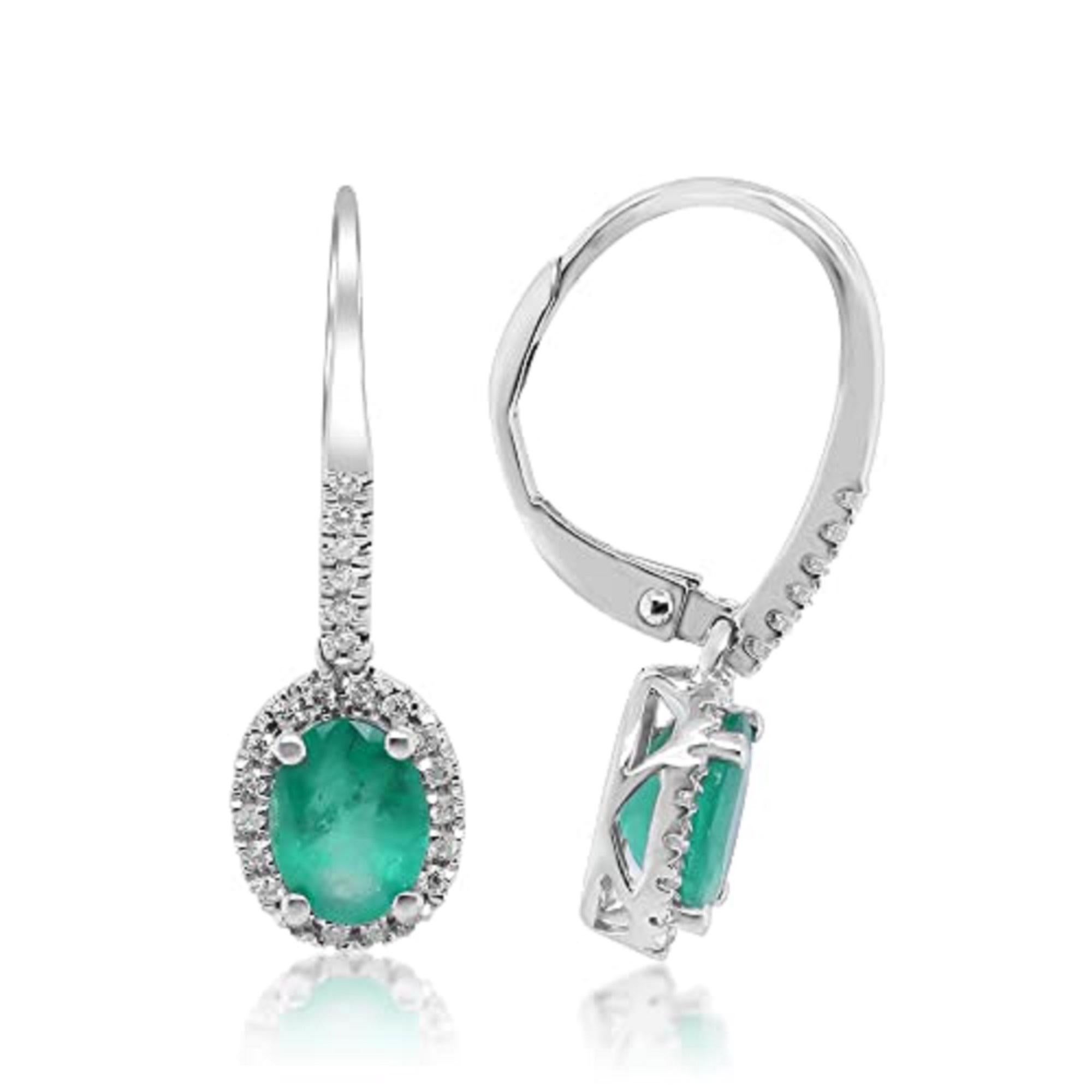 Details Crafted of 14-karat white gold, these elegant dangle earrings showcase oval-cut Gin & Grace Natural emeralds bordered by a halo of Natural white diamonds. A high polish finish and leverback clasps complete the look of these beautiful