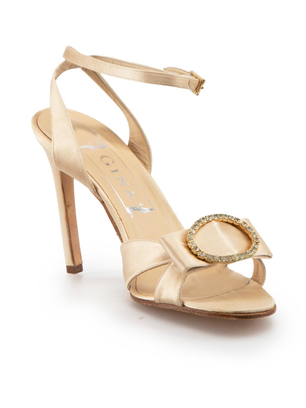 CONDITION is Very good. Minimal wear to sandals is evident. Minimal wear to the right-side toe strap of both shoes, as well as the heel of the left shoe and footbed of the right shoe with discoloured marks to the satin on this used Gina designer