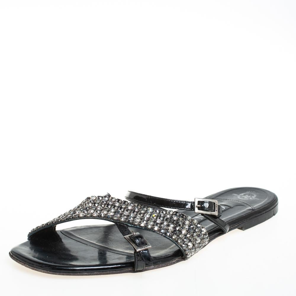 These black sandals from Gina are filled with so much beauty, they make our hearts flutter! They carry open toes and crystal embellishments decorated on the patent leather exterior. These beauties are complete with comfortable insoles and durable