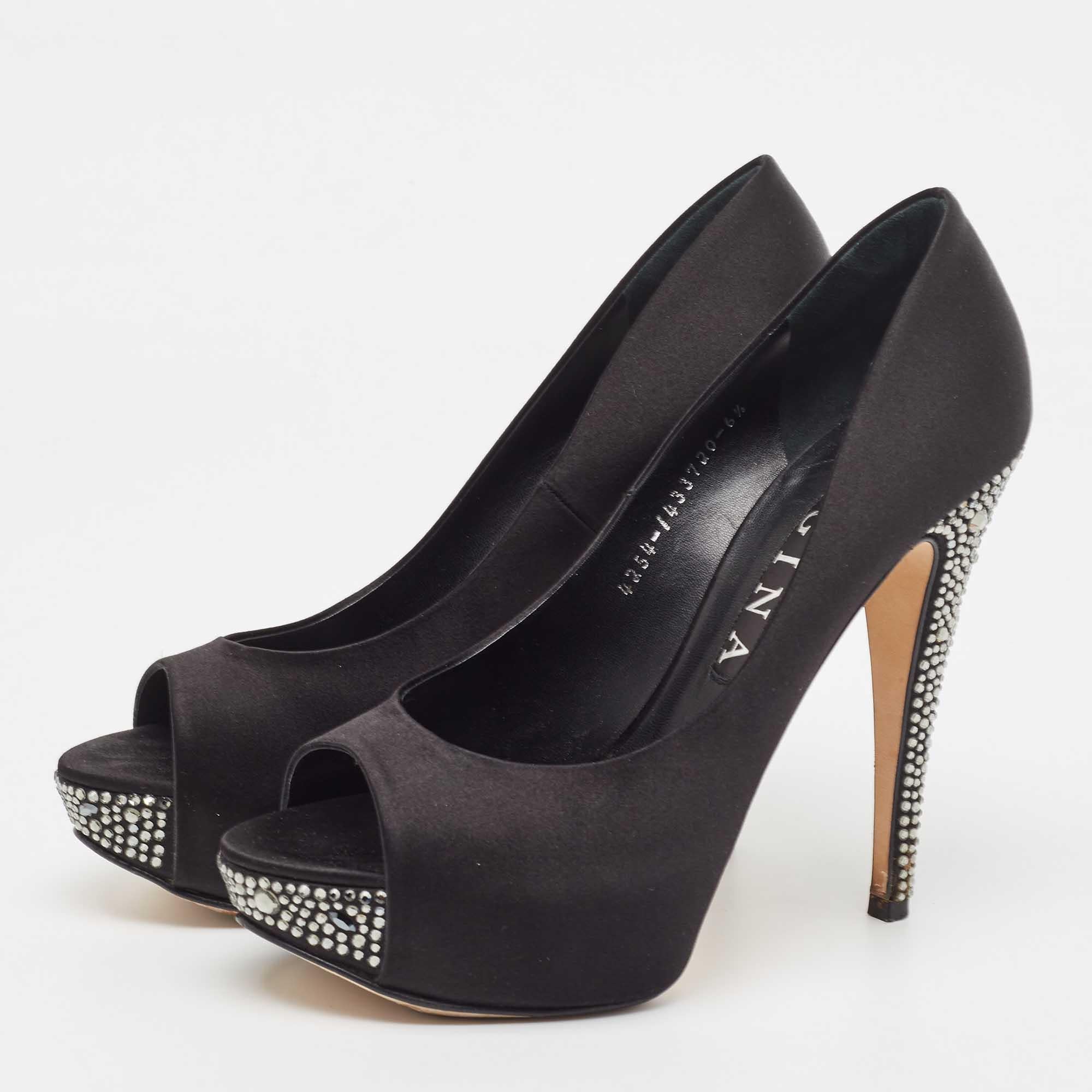 Gina knows how to make hearts skip a beat and these white sandals do just that They come crafted from black satin in a peep toe silhouette and feature crystals embellished on the platforms and on the 13.5 cm heels. They are equipped with comfortable