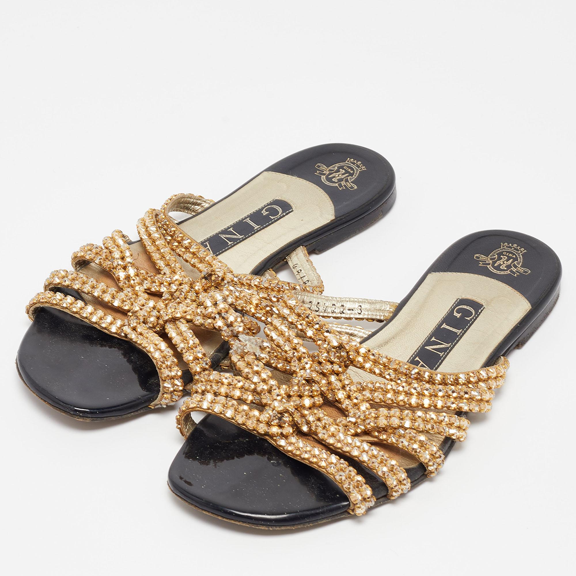Bring nothing but charming and luxe vibes to your ensemble as you wear these stunning slide sandals from the House of Gina. They are created using leather, which is highlighted by matching crystal embellishments. Complement your outfit with these