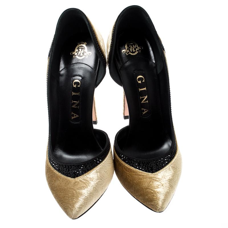 Posh looks combine here with gold paisley prints for an elegantly classy look. These beautiful pumps by Gina are crafted in velvet and flaunt black, crystal-studded satin trims on the toplines. Pair these pointed-toe pumps, designed in a D'orsay