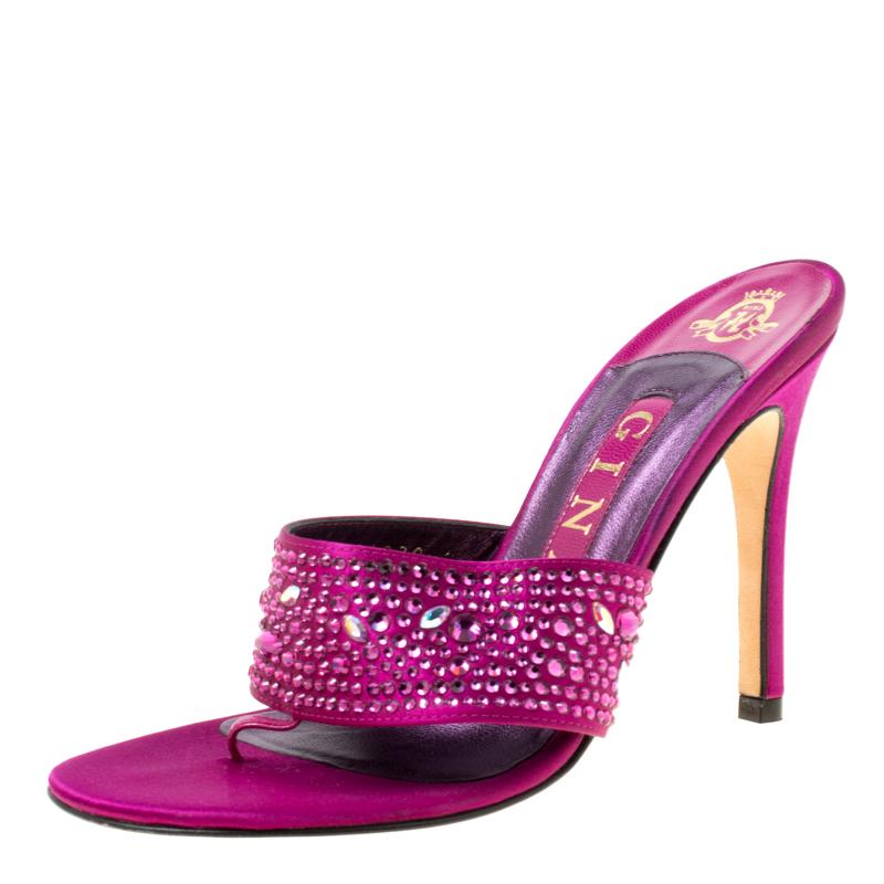 Bursting with shimmer, Gina designed these sandals to catch one's eye. They are constructed in a thong style and embellished with beautiful crystals. The purple sandals will give you glamour and lift you and your confidence.

Includes: The Luxury