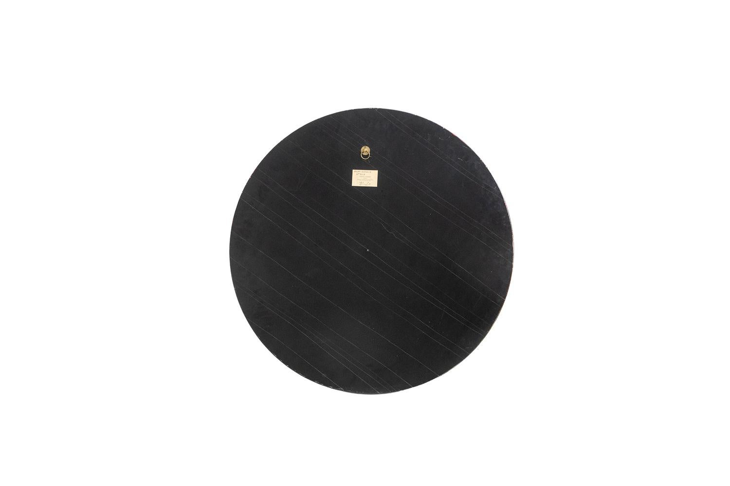 Ginette Clément, par.

Lacquer mirror, in red tones, round in shape.

French work realized in 1966.

Dimensions: D 95 x D 2.5 cm

Reference: LS6146181A