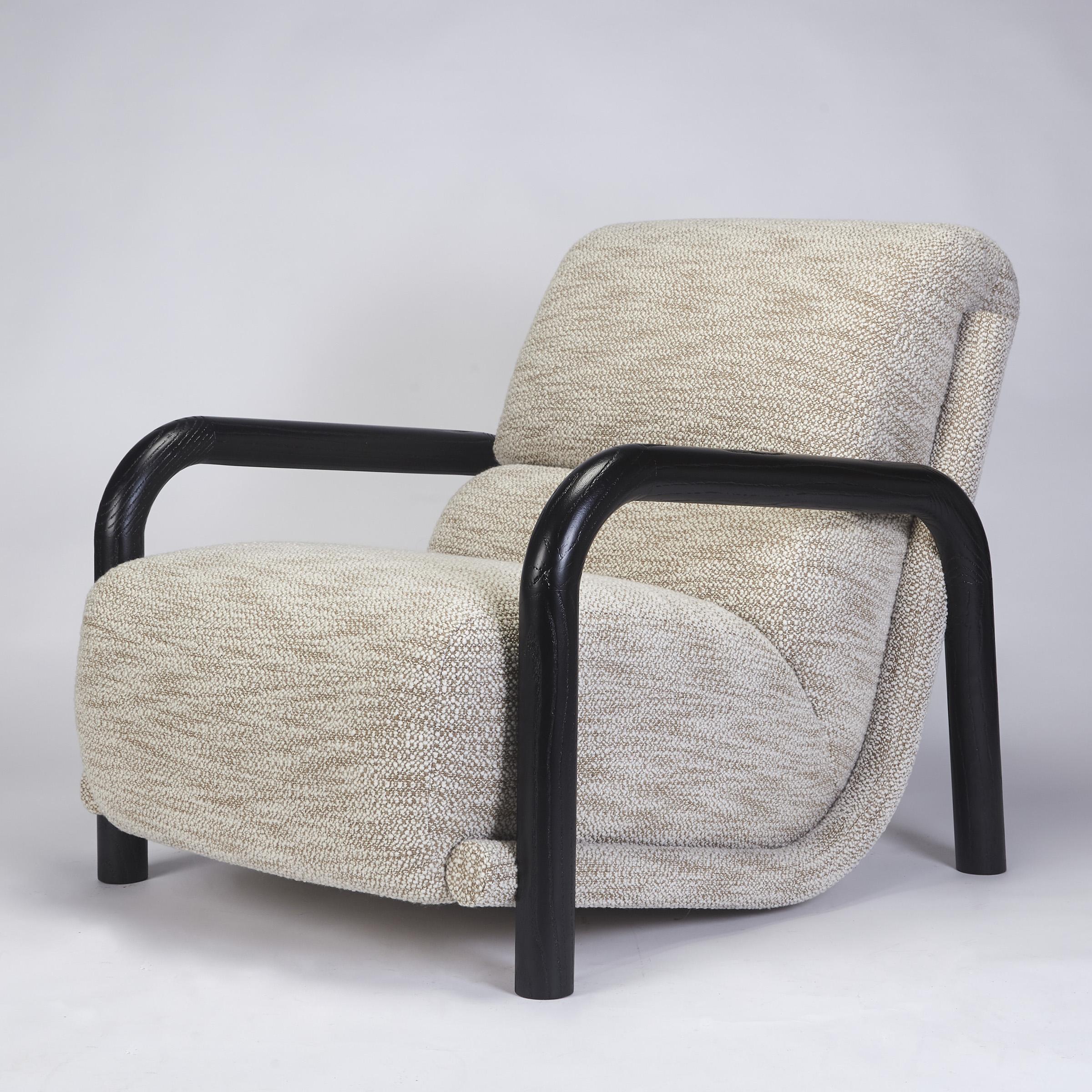 Ginga Armchair XL in Black Oak, Handcrafted in Portugal by Duistt

Ginga is the swaying movement of Brazilian martial art, Capoeira. It is characterized by a flowing movement from one side to the other, and that is what Ginga armchair conveys. A