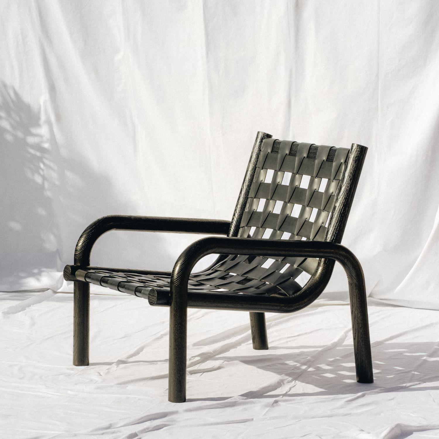 Ginga Leather Armchair, Solid Black Oak, Handcrafted in Portugal by Duistt

Ginga is the swaying movement of Brazilian martial art, capoeira. It is characterized by a flowing movement from one side to another, and this is what Ginga's armchair