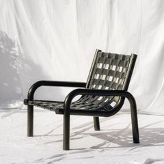 Ginga Lounge-Sessel, Schwarzes Leder, Beine aus massiver schwarzer Eiche, Sand gebürstet