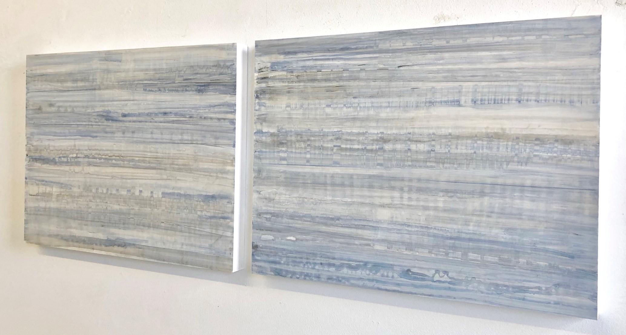 Nature-Inspired Minimalist Abstract Color Field painting on two wood panels in shades of light, icy blue, white and grey 
Acrylic on two wood panel, Each panel is 18 x 24 x 1.5 inches
Suggested installation is 1-2 inches between each panel
Panels