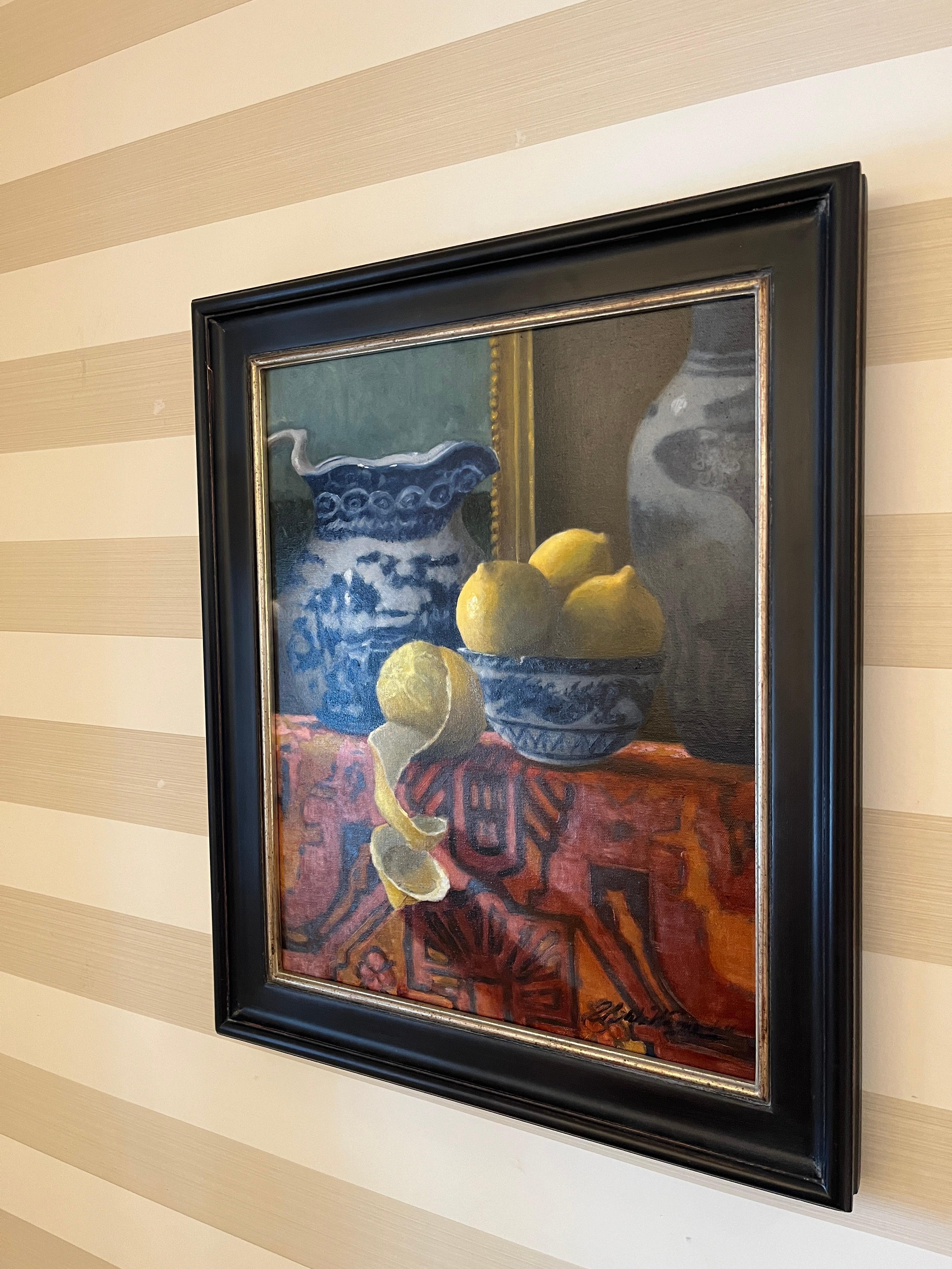 This is an original oil painting on by Ginny Williams. Celebrating the elements of still life often found in paintings of the Dutch golden age, this piece showcases blue and white porcelain, a Turkish rug, and lemons.

Williams has a degree in art