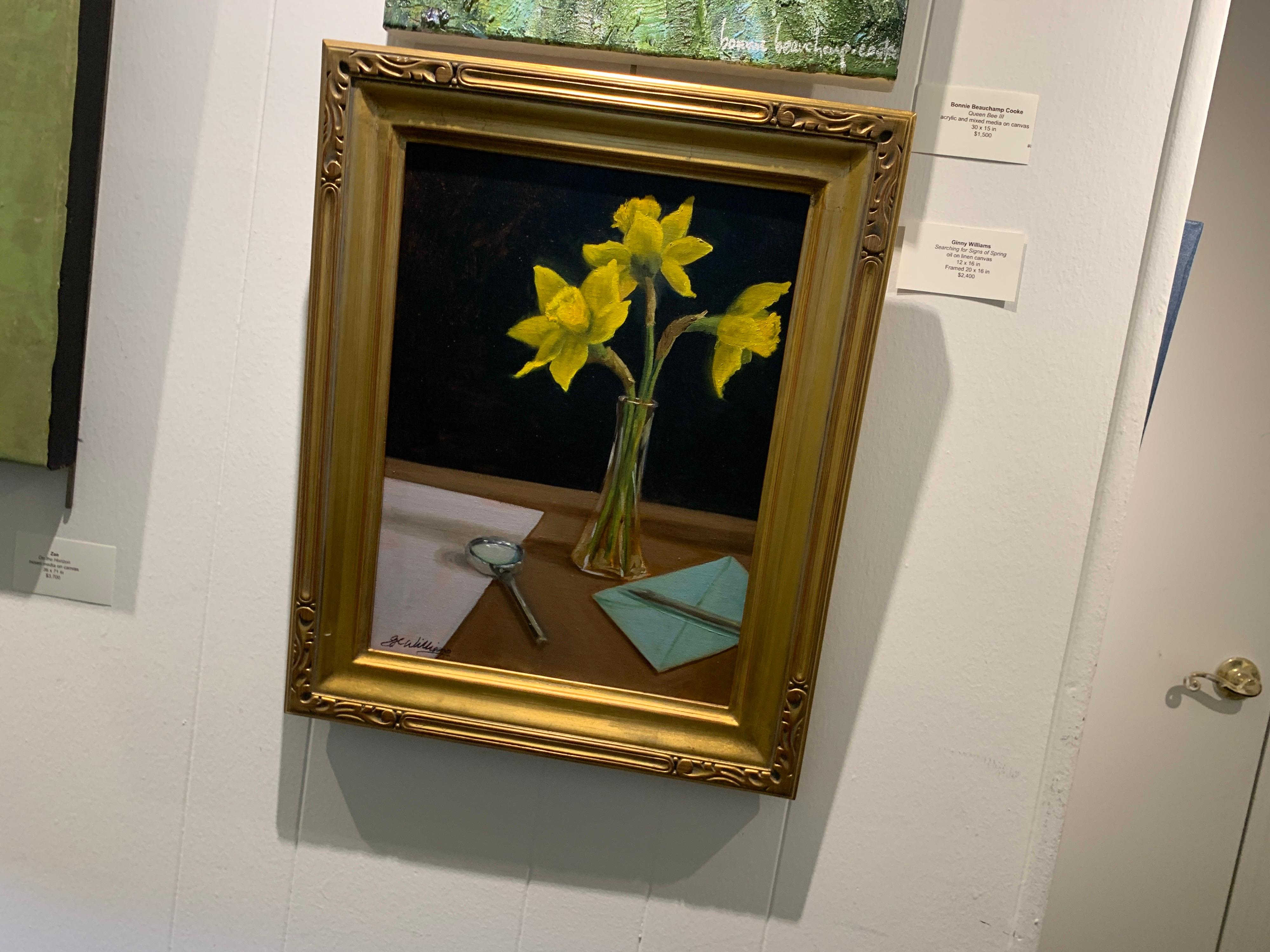 Set inside a gilt molded frame, this oil on linen still-life painting is signed lower right. Without its frame, it measures 16 x 12 inches.

We were immediately drawn to the thoughtfully painted work, the clever titles and the rich, deep hues. And