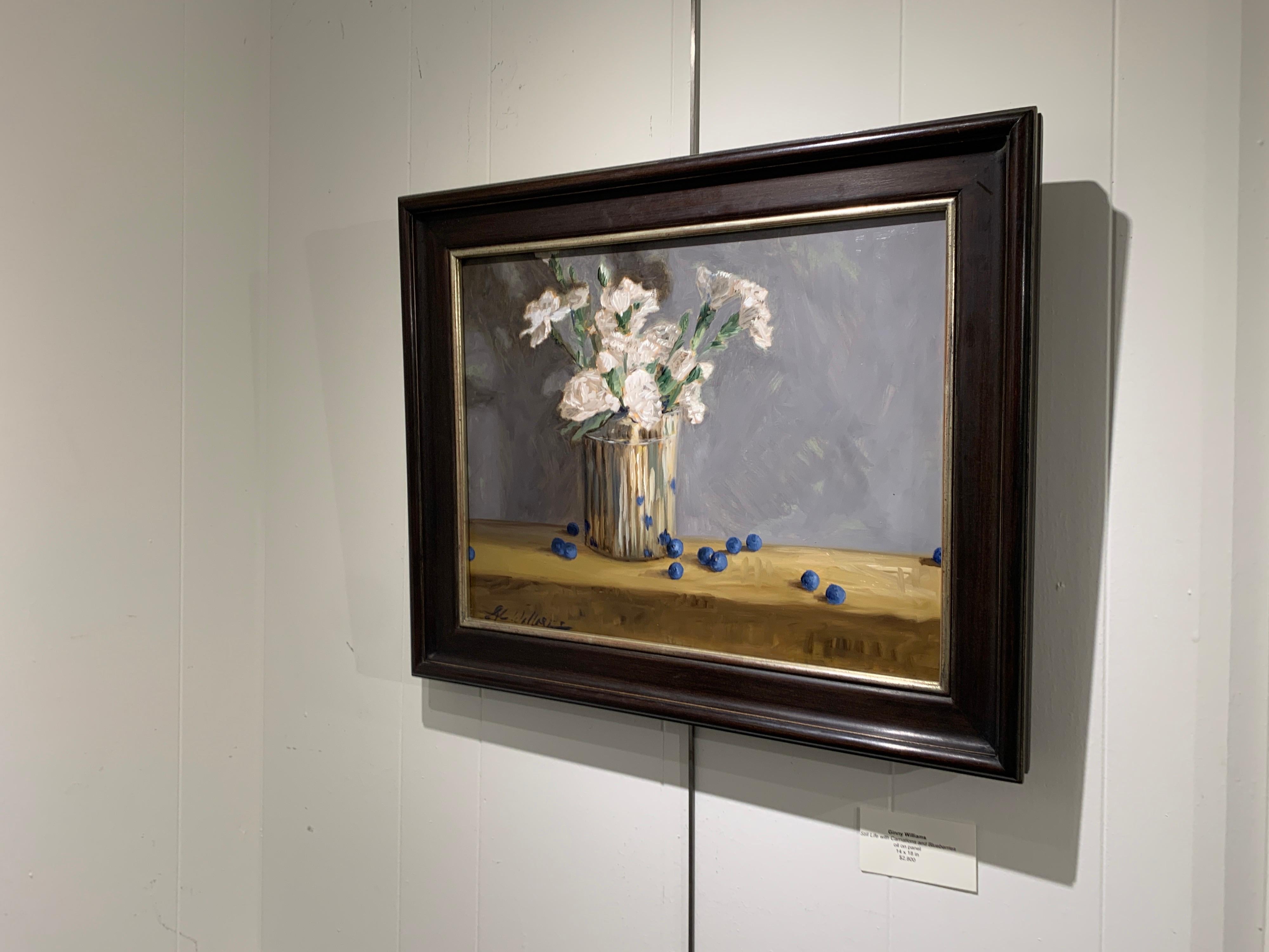 Set inside a gilt molded frame, this oil on linen still-life painting is signed lower right. Without its frame, it measures 14 x 18 inches.

We were immediately drawn to the thoughtfully painted work, the clever titles and the rich, deep hues. And