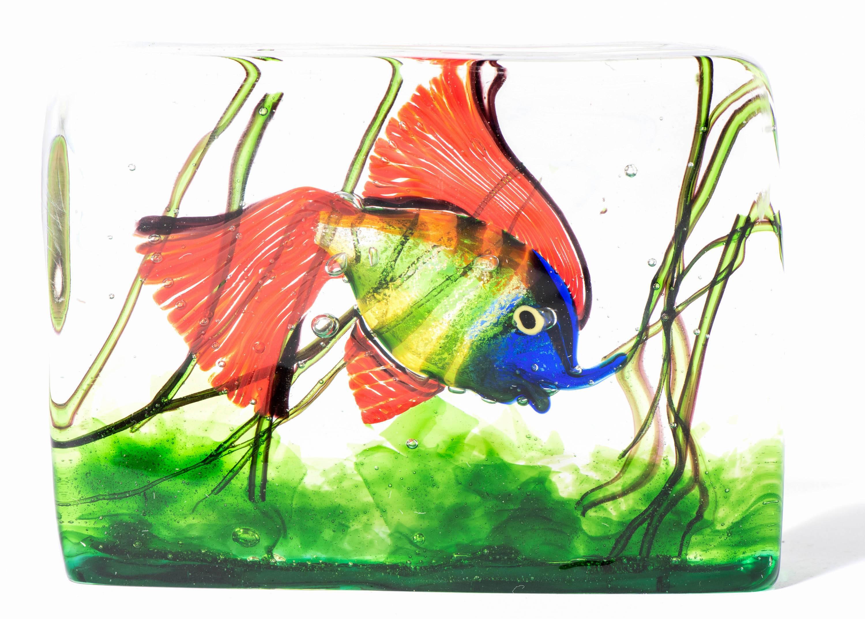 A large Gino Cendese glass aquarium. Murano.
Design attributed to Riccardo Licata.
Three-dimensional water scene created from three colorless glass panels with polychrome fish and grasses.
Italy,
circa 1960
Measures: 12 cm x 16 cm x 4 cm.
 
