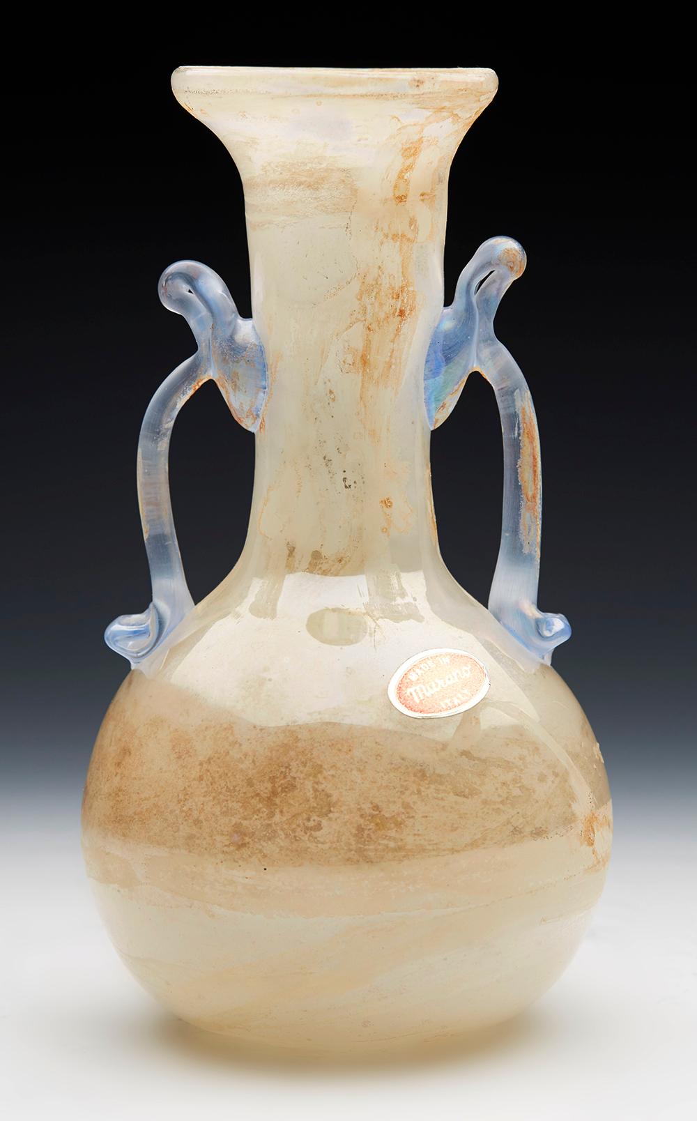 A very stylish midcentury Italian Murano Scavo (excavated) art glass twin handled vase attributed to Gino Cenedese (Italian, 1907-1973) and dating from around 1960. The vase of bottle or flask shape with applied handles to either side is hand blown