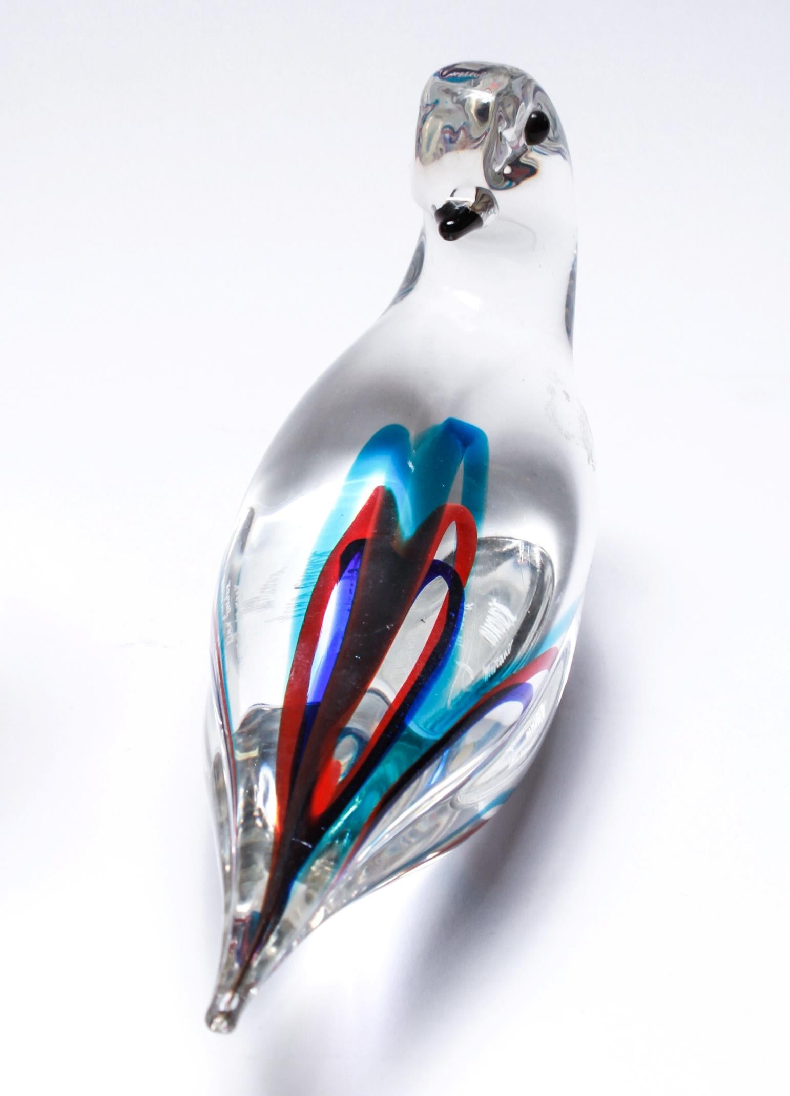 Italian Murano glass bird figure designed by Gino Cenedese in clear glass with color accents, marked on the underside 