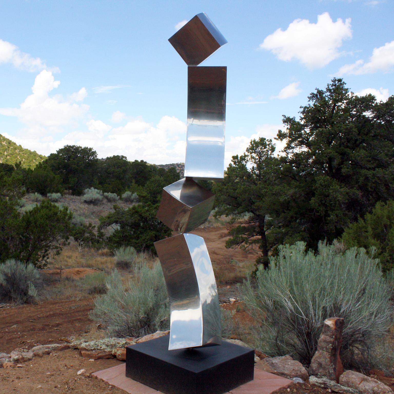"A.I.C. par Gino Miles
Sculpture abstraite en acier inoxydable poli (les dimensions comprennent la base de 12" x 30" x 30").

Travaillant principalement l'acier inoxydable et le bronze, Gino Miles crée des pièces axées sur un minimalisme élégant et