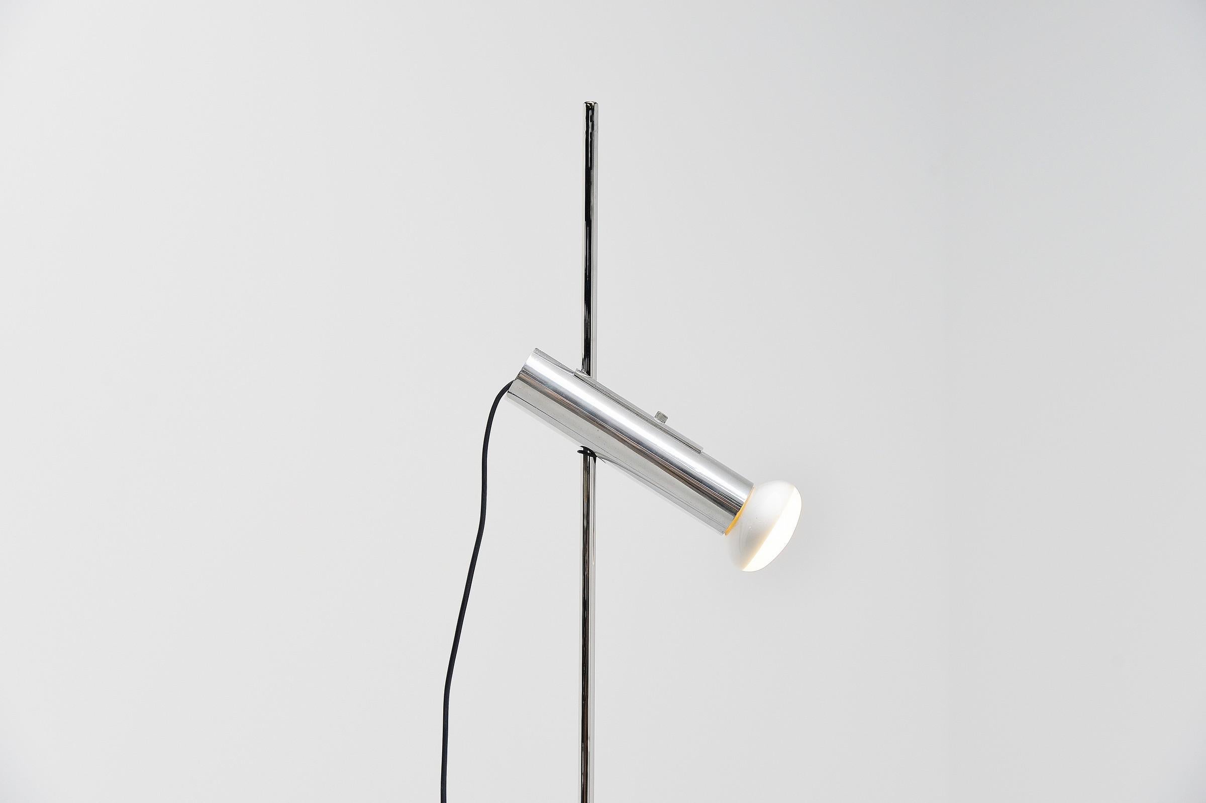 Minimalist floor lamp designed by Gino Sarfatti and manufactured by Arteluce, Italy 1957. This minimal floor lamp has a visible light bulb. Sleeve in polished or lacquered aluminium that moves in all directions and slides along the stem. Rubber