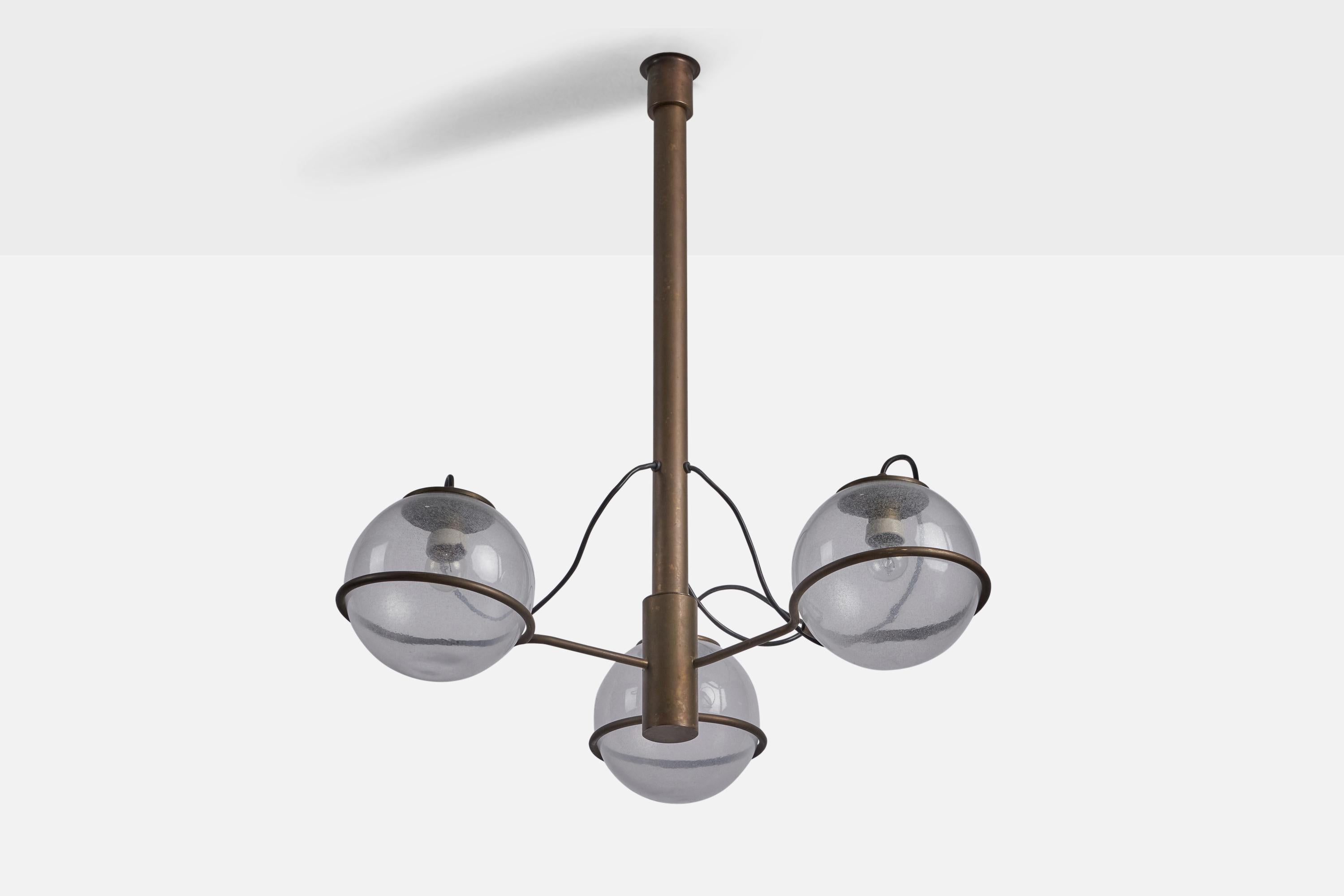 A three-armed brass and glass chandelier attributed to Gino Sarfatti, Italy, 1960s.

Overall Dimensions (inches): 33.5” H x 27” Diameter
Bulb Specifications: E-26 Bulb
Number of Sockets: 3