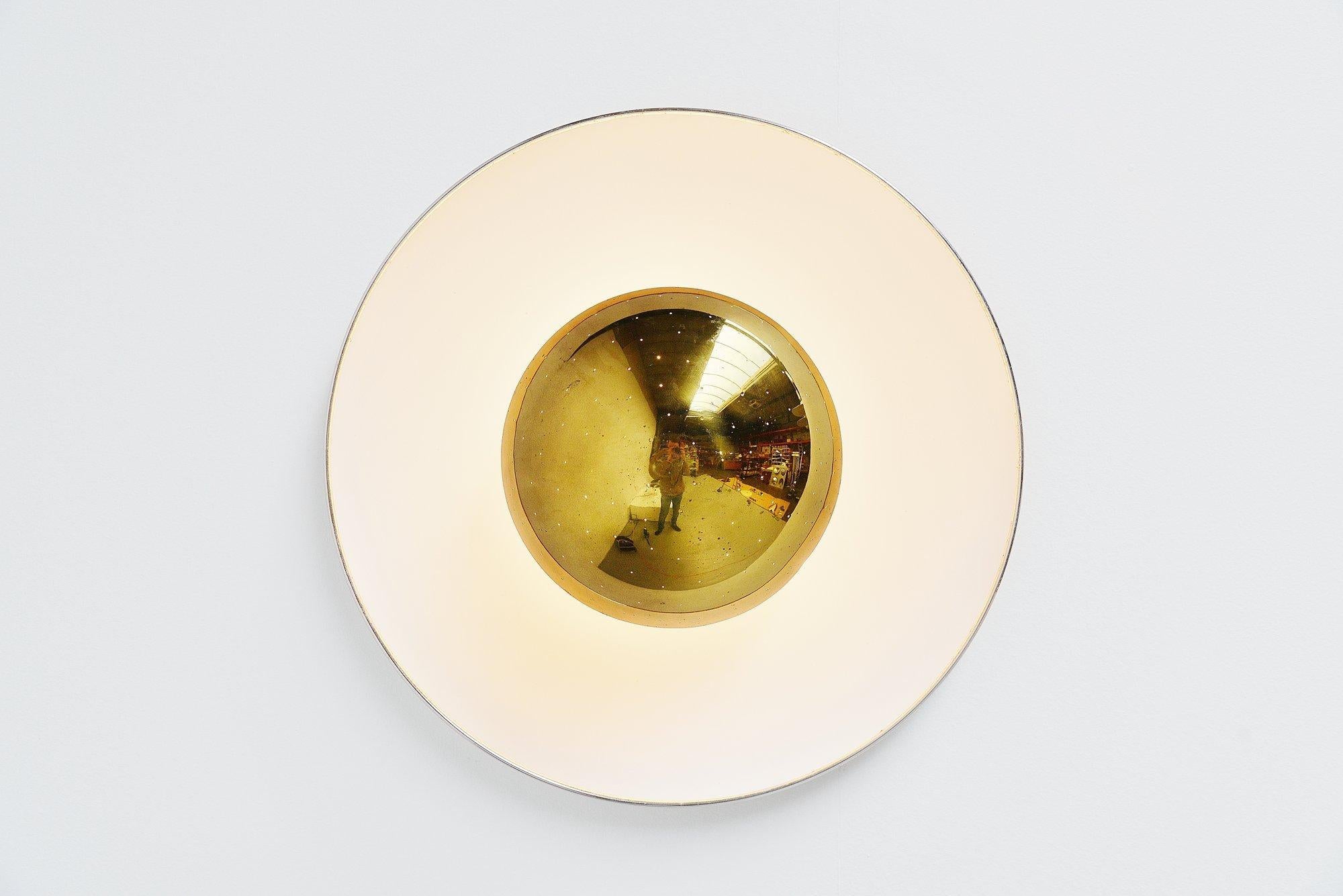 Rare ceiling lamp designed by Gino Sarfatti for Arteluce, Milano, 1950. This very nice dish shaped ceiling lamp is Mod. No. 155 and was made of white lacquered aluminium and brass edge and diffuser shade. This lamp gives fantastic light when lit and