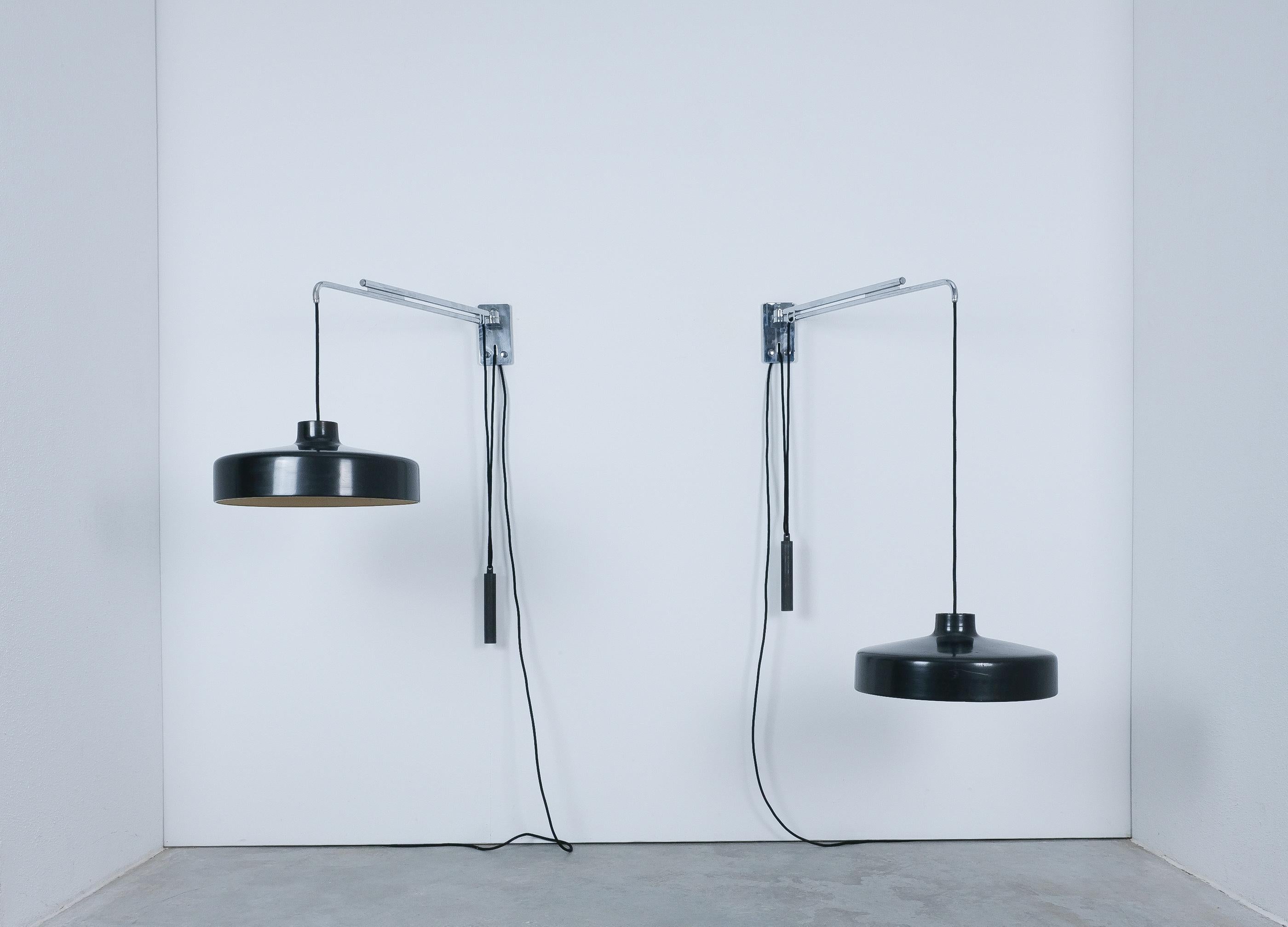 Autentica coppia di lampade a sospensione da parete Gino Sarfatti for Arteluce modello 194/N, circa 1950. Lacca originale, buone condizioni, pronto all'uso. Abbiamo due luci disponibili, con prezzo individuale

Un fantastico set di 2 luci da parete,