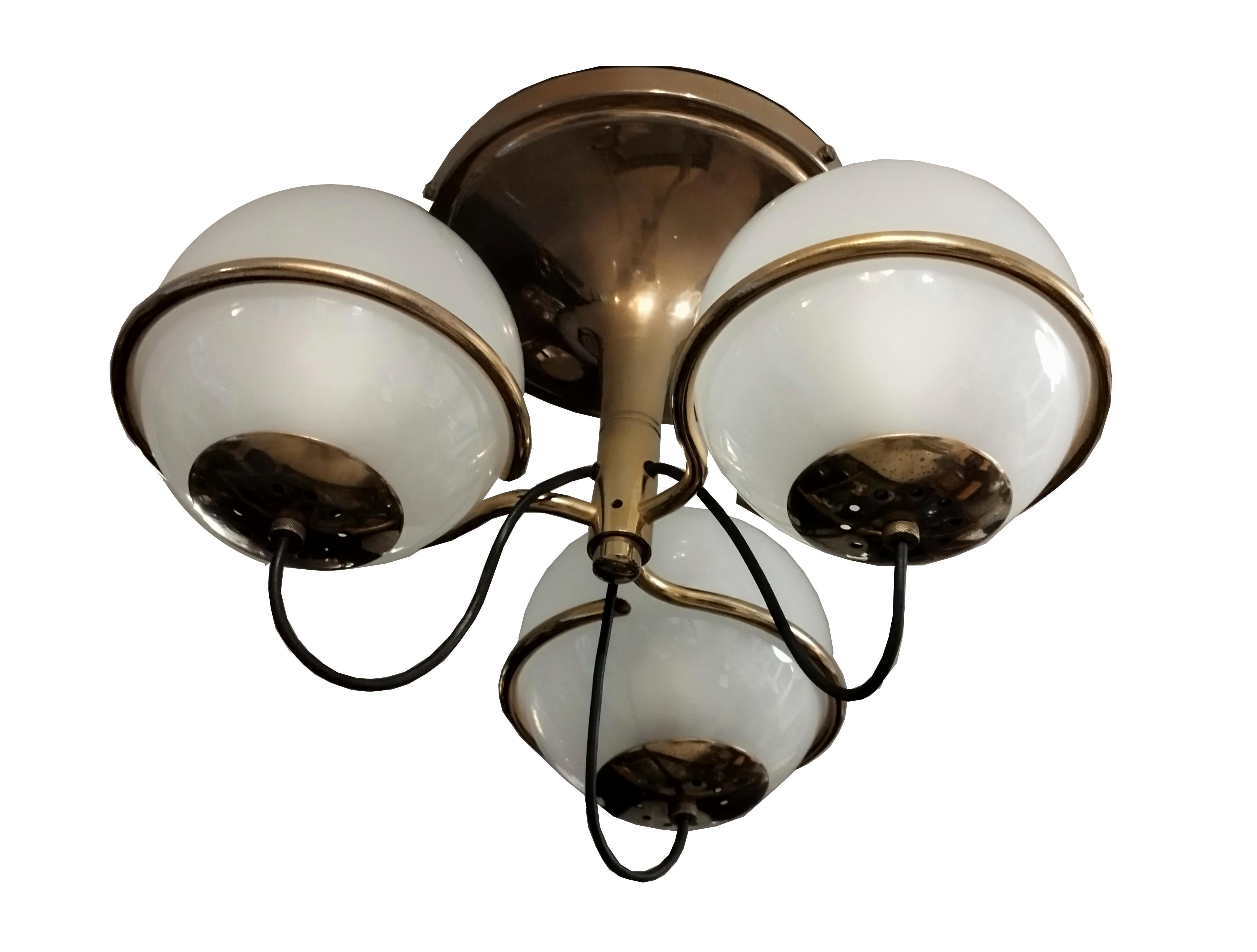 Rare ceiling lamp model 2042/3 designed by Gino Sarfatti and produced by Arteluce, Italy 1960. This version of the 2042 lamp has a gilded metal frame and 3 glass globes that produce an incredible warm and atmospheric light. The lamp is completely