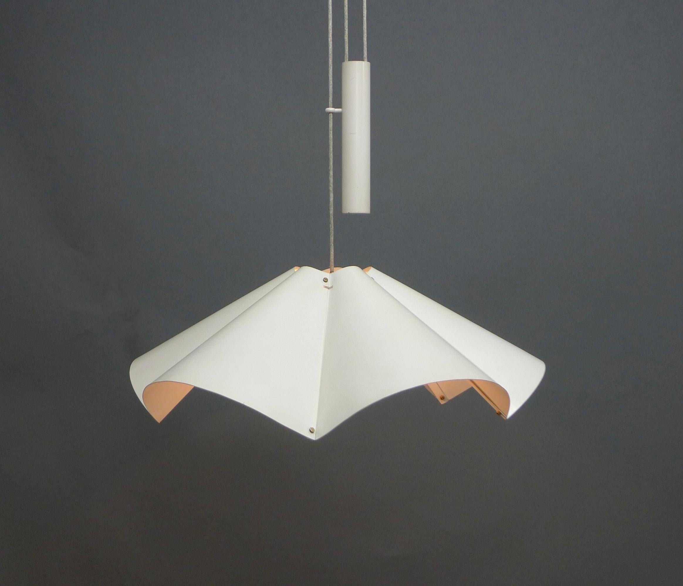 Gino Sarfatti, Rise and Fall Pendant Light, model 2134, designed by Sarfatti and made by his company Arteluce in the 1950s.

Comprising a fluted circular aluminium shade painted in off-white on a cord with rise and fall handle, allowing the shade to