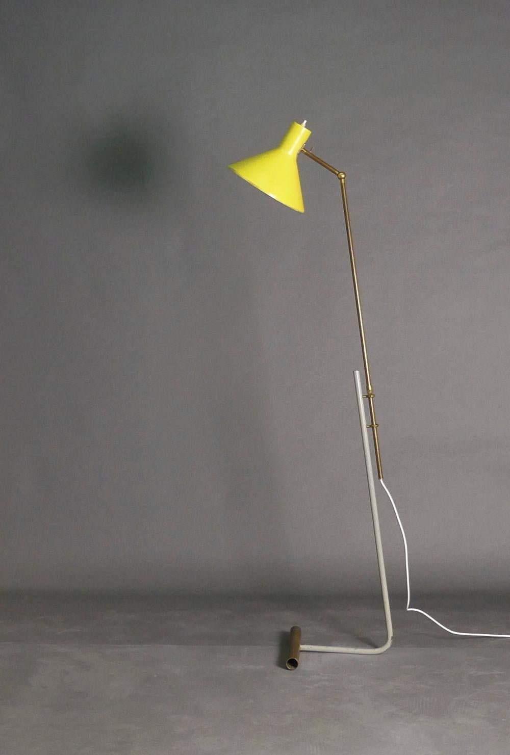 Gino Sarfatti, Floor Light, model 1045 for Arteluce, Italy.

Designed in 1948, this example is likely to have been one of the first production run, as it has a brass upper stem (later versions were chrome plated) and open brass foot. The lamp has an