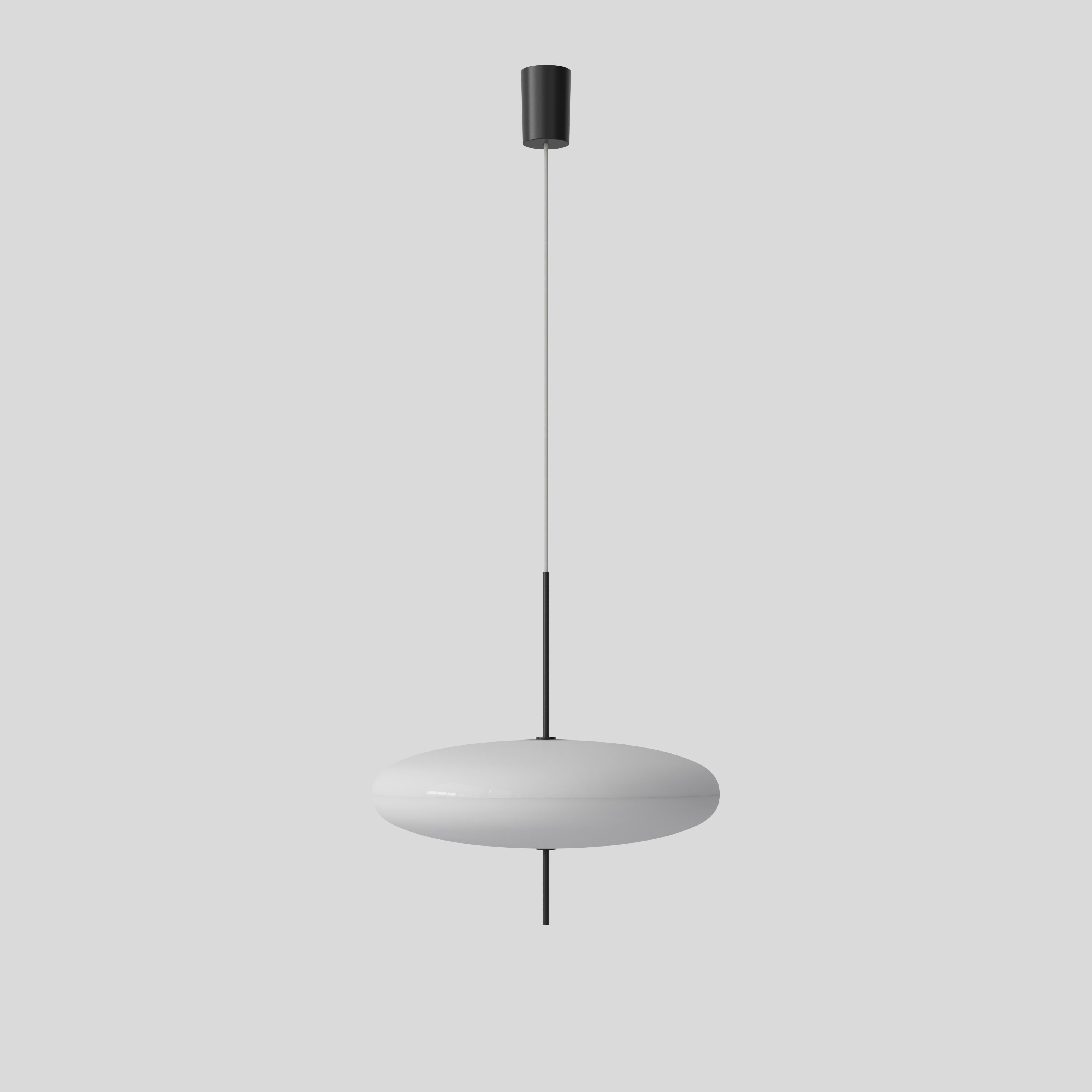 Gino Sarfatti lamp model 2065.
White diffuser, black hardware, white cable.
Manufactured by Astep

Model 2065
Design by Gino Sarfatti
The 2065 is made of two joined opaline methacrylate saucer-shaped diffusers suspended from the ceiling with a black