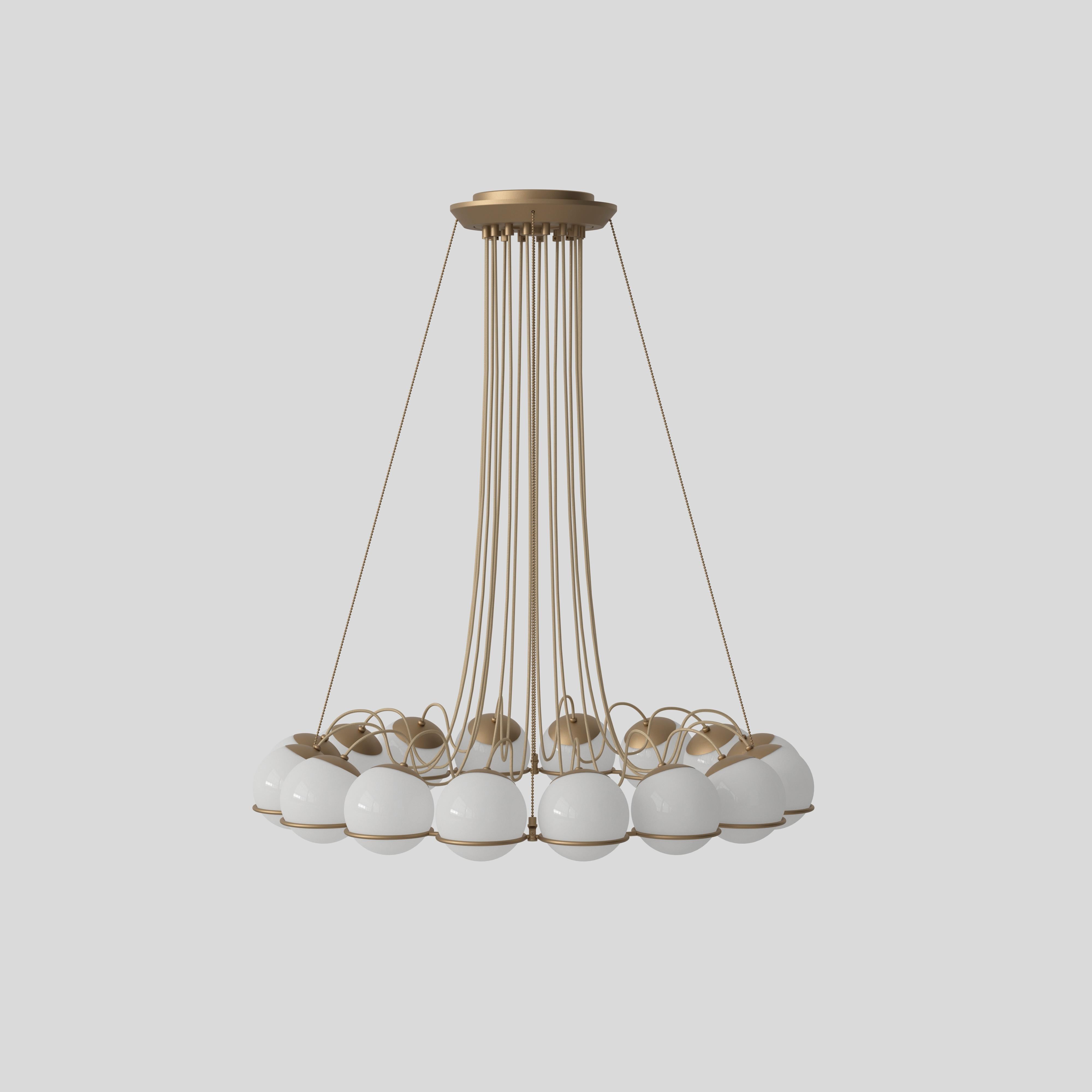 Model 2109
Design by Gino Sarfatti
The Le Sfere Chandelier is composed of a circular array of blown opaline glass spheres. Each sphere is held in place by a large Black or Champagne painted aluminium ring-structure. Each ring has a small cut,