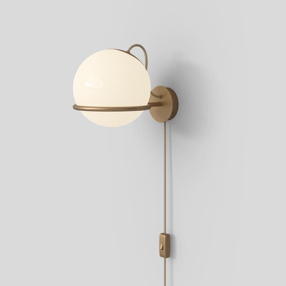 Model 238/1 with Switch
Design by Gino Sarfatti

Specifications model 238/1
Typology wall
Materials: Opaline glass diffuser, steel structure
Dimensions: W 200 x D 300 x H 210mm
Diffuser Diameter Ø 200mm
Weight 1.55kg
Light source 1 x E27 LED