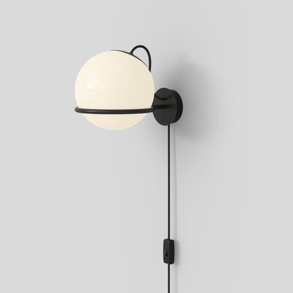 Model 238/1 with Switch
Design by Gino Sarfatti

Specifications model 238/1
Typology wall
Materials: Opaline glass diffuser, steel structure
Dimensions: W 200 x D 300 x H 210mm
Diffuser Diameter Ø 200mm
Weight 1.55kg
Light source 1 x E27 LED