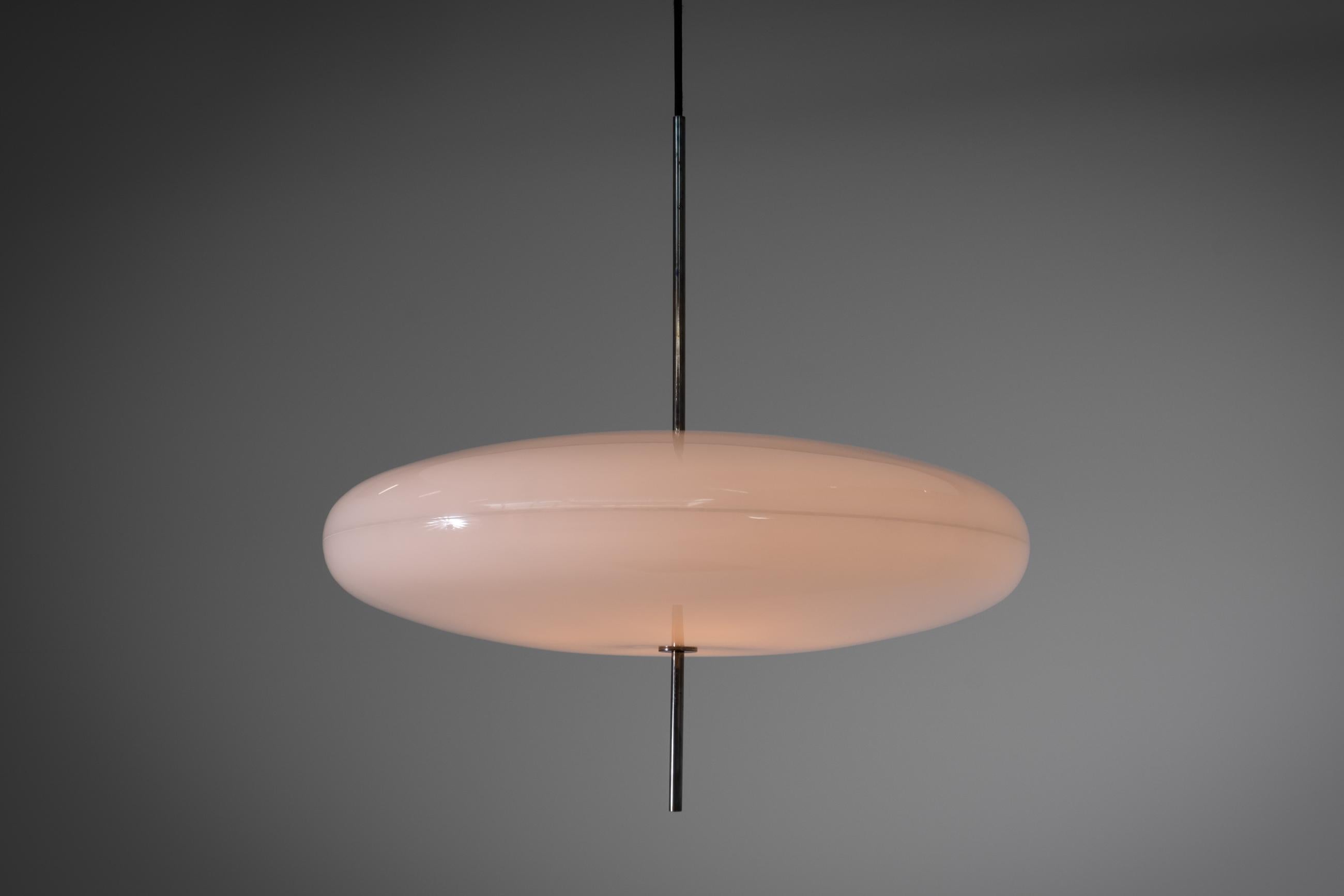 Iconic design, chandelier mod. 2065 GF by Gino Sarfatti for Arteluce, Italy 1952. This is the original edition Arteluce, so not a later remake. The lamp is made of two acrylic glass shells held together by a refined blackened brass tube system.