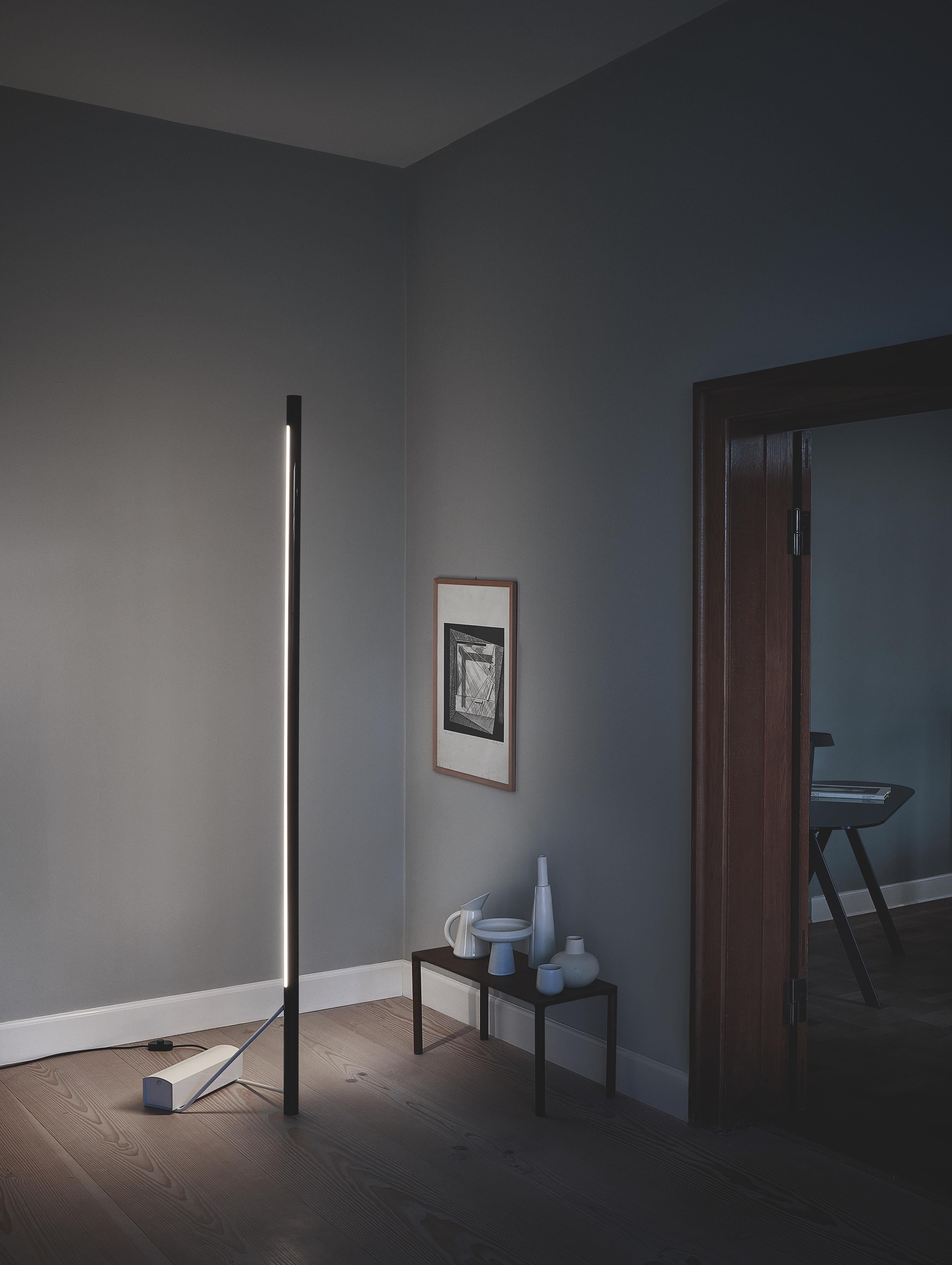 Gino Sarfatti model #1063 floor lamp in black and white for Flos / Astep. Designed in 1954, this is an authorized 2013 Astep/Flos re-edition by Alessandro Sarfatti, grandson of Gino Sarfatti, who applies his grandfather's scrupulous attention to
