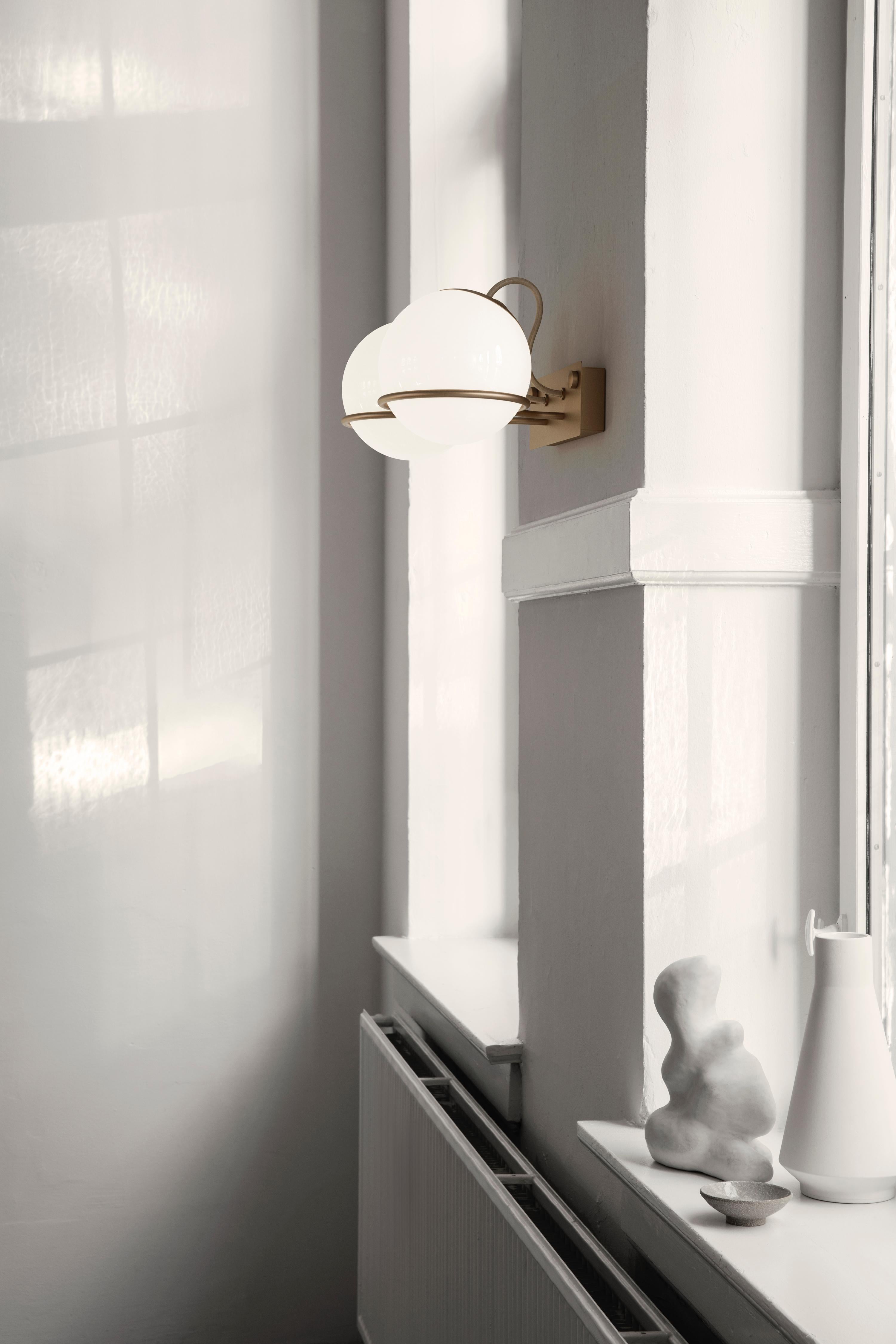 Gino Sarfatti Model 238/2 wall lamp in champagne for Astep. 

Designed in 1959, this is an authorized Astep/Flos re-edition by Alessandro Sarfatti, grandson of Gino Sarfatti, who applies his grandfather's scrupulous attention to detail and materials