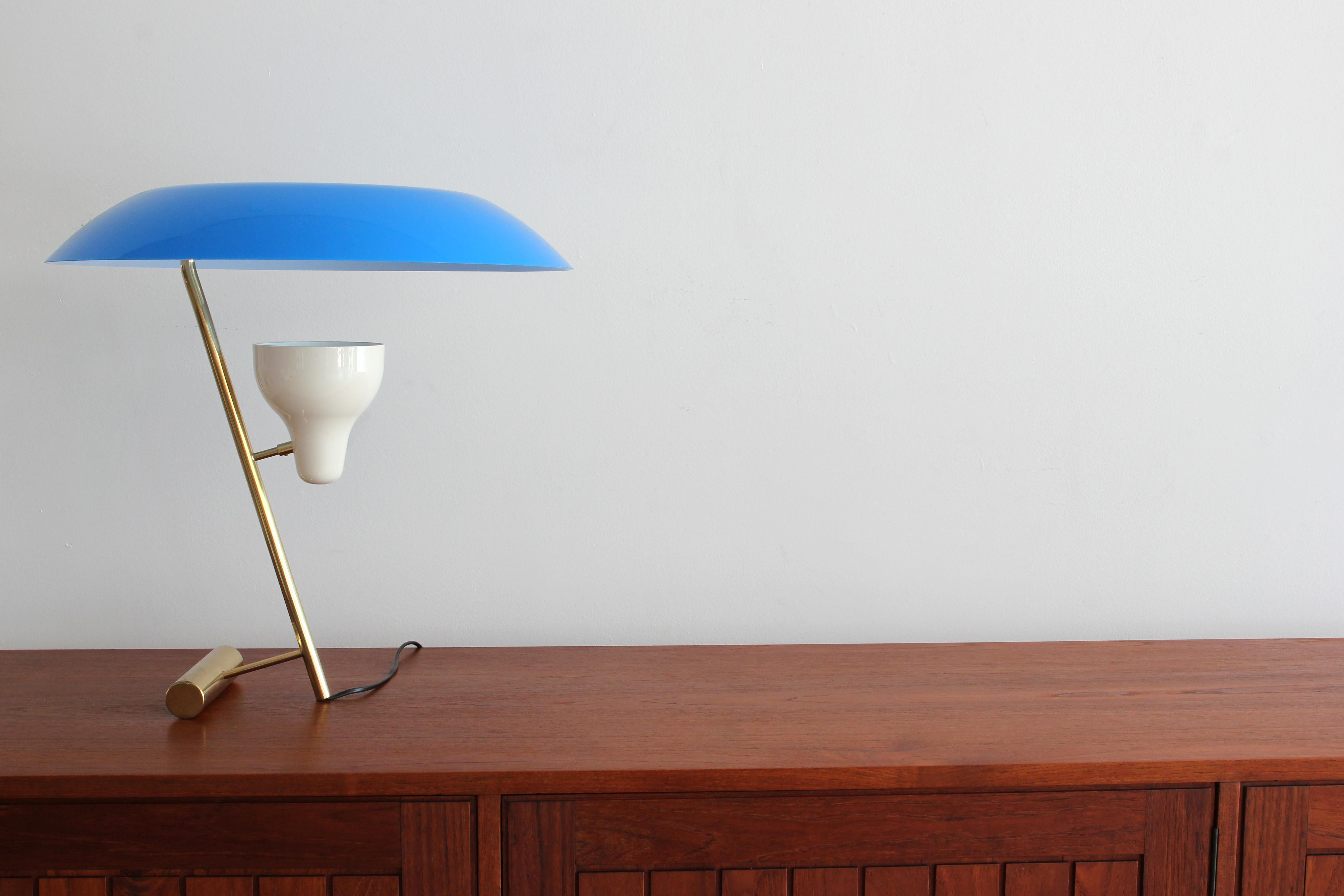 Iconic table lamp by Gino Sarfatti with reflected and diffused LED light and characteristic azure methacrylate diffuser. 
First edition of reproduction, circa early 2000s.

 