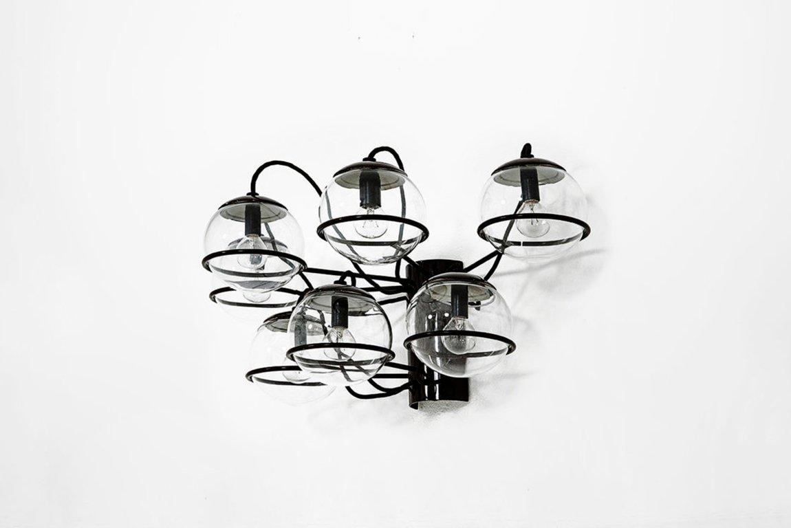 Gino Sarfatti (1912-1985)

Sconce with seven arms model 237/7
Manufactured by Arteluce
Italy, 1959
Painted tubular metal, painted metal, transparent glass

Measurements:
76.3 cm x 41.7 cm x 41.2 H cm
30 in x 16.38 in x 16.25 H