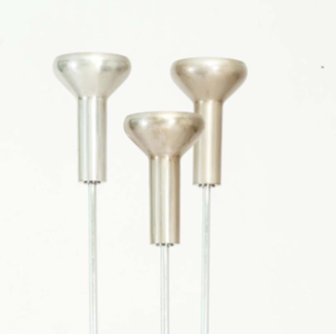 Gino Sarfatti, set of 3 1073 floor lamps - Italy, 1960s
Edited by Arteluce
Cast iron base, chrome metal, aluminium
1 lamp: 72 in. high / 183 cm
2 lamps: 77.5 in. high / 195.6 cm

Slight differences of patina between the lamps.