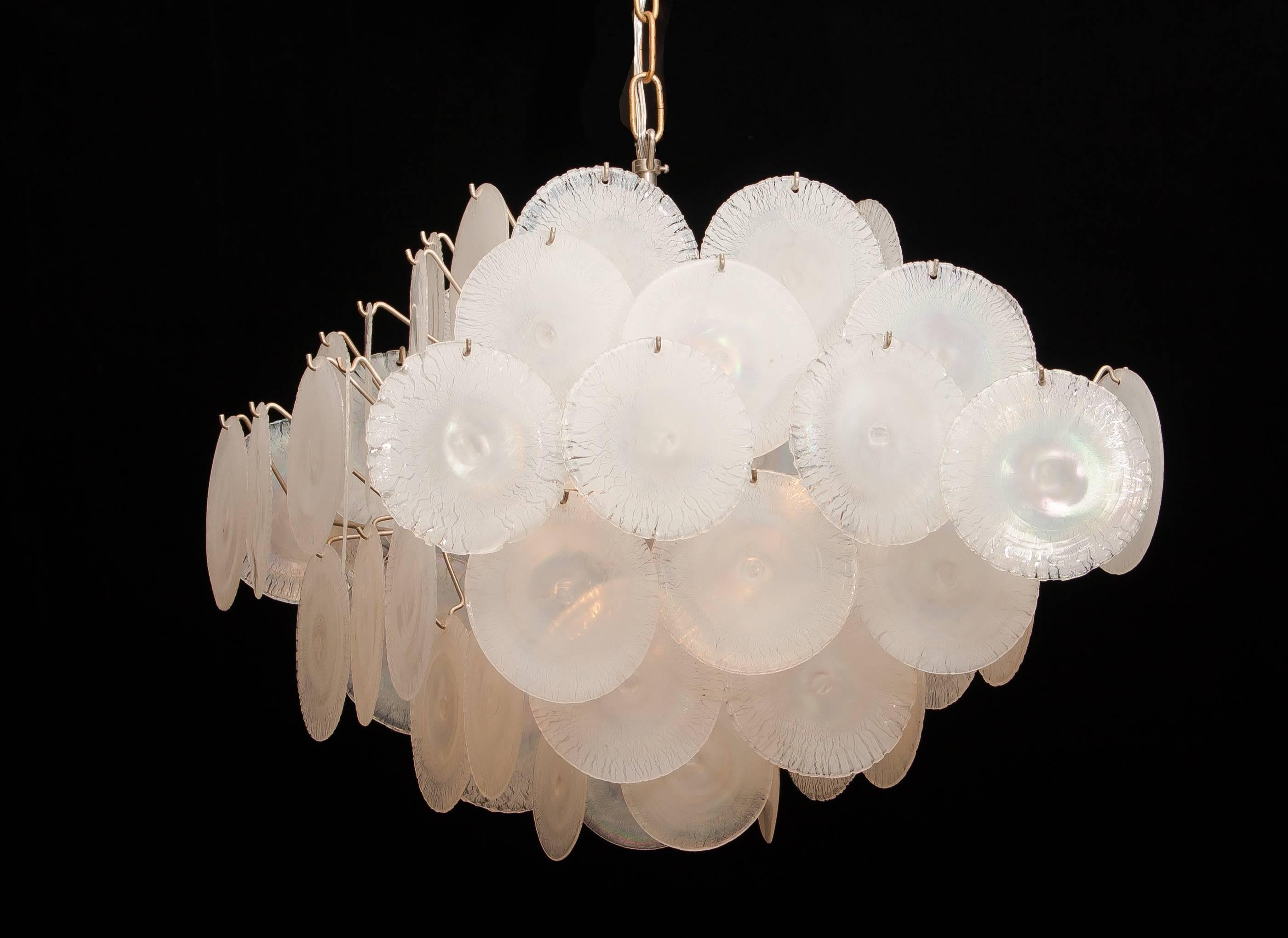 Extremely beautiful Gino Vistosi chandelier with white or pearl colored handmade Murano crystal discs. 

This Gino Vistosi chandelier is made in Italy in the 1960s. The chandelier contains 60 Murano white/pearl coloured crystal discs. All in