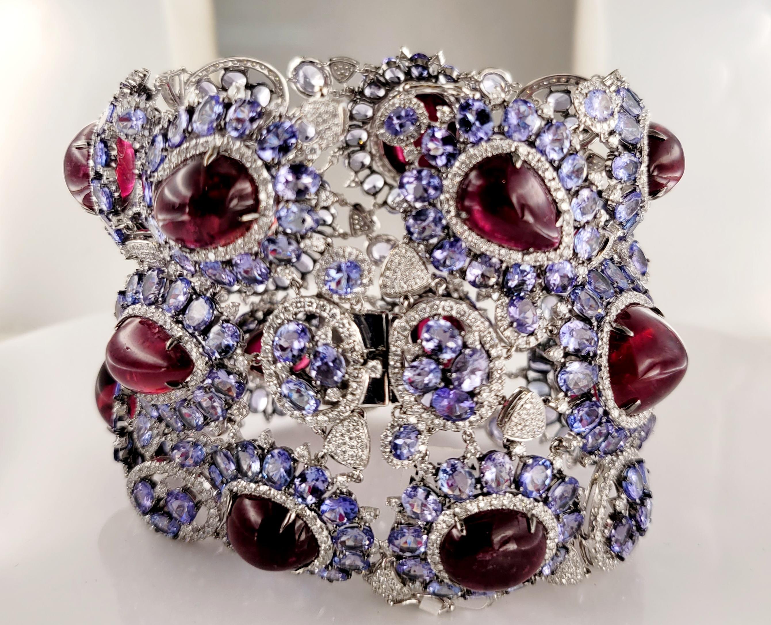 This magnificent bracelet showcases a stunning 237 carat Rubellite, complemented by 16 carats of breathtaking Tanzanite and 8 carats sparkling Diamonds. The piece is crafted in 18 karat white gold and designed for those who appreciate the finer