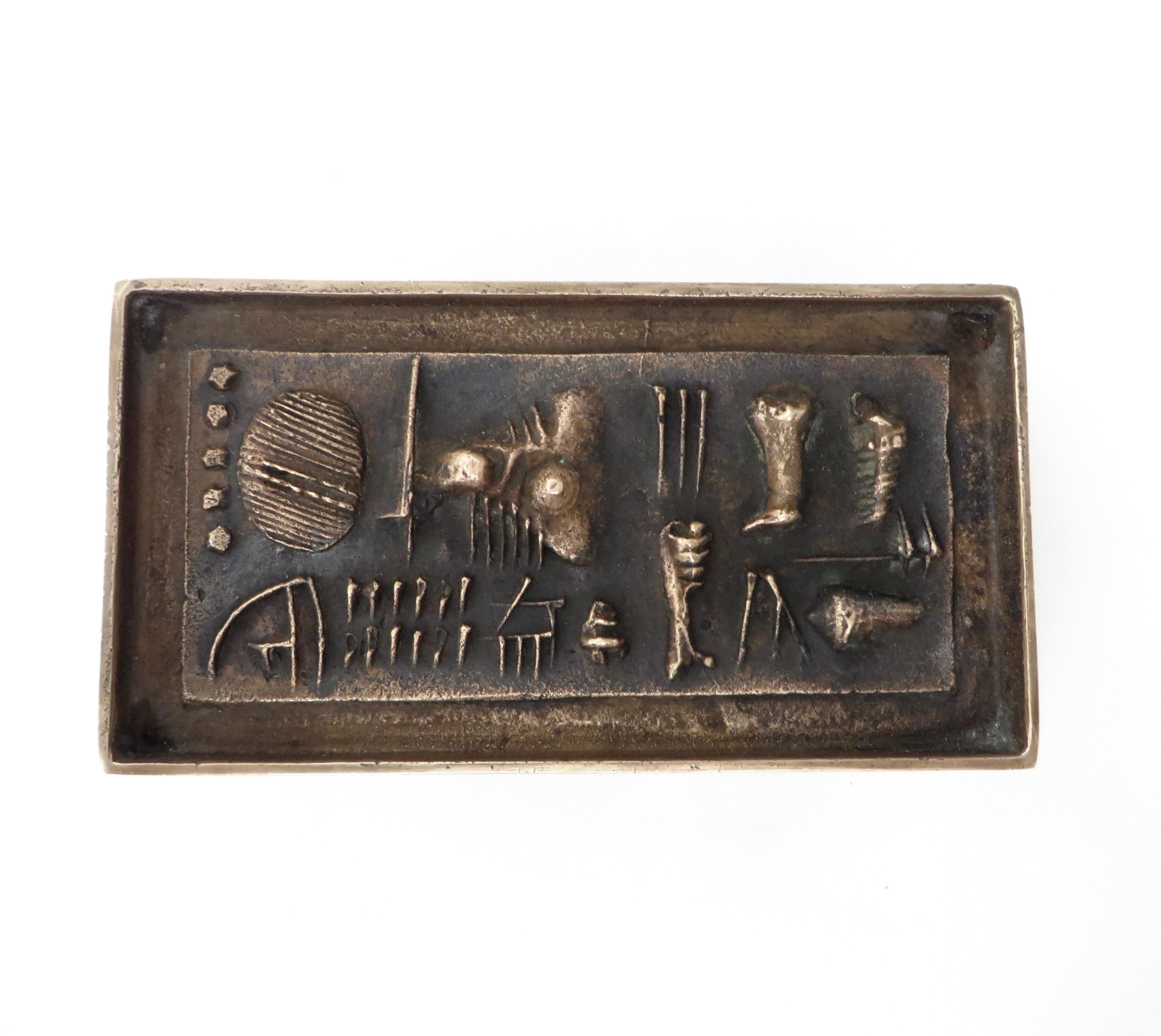 Gio and Arnoldo Pomodoro Cast Bronze Box Sculpture Signed II Sestante 
Sculptural box with lid decorated with geometric motifs, after 1957
Signed under the base: IL SESTANTE, POMODORO
The box is part of a series of four boxes made by the two