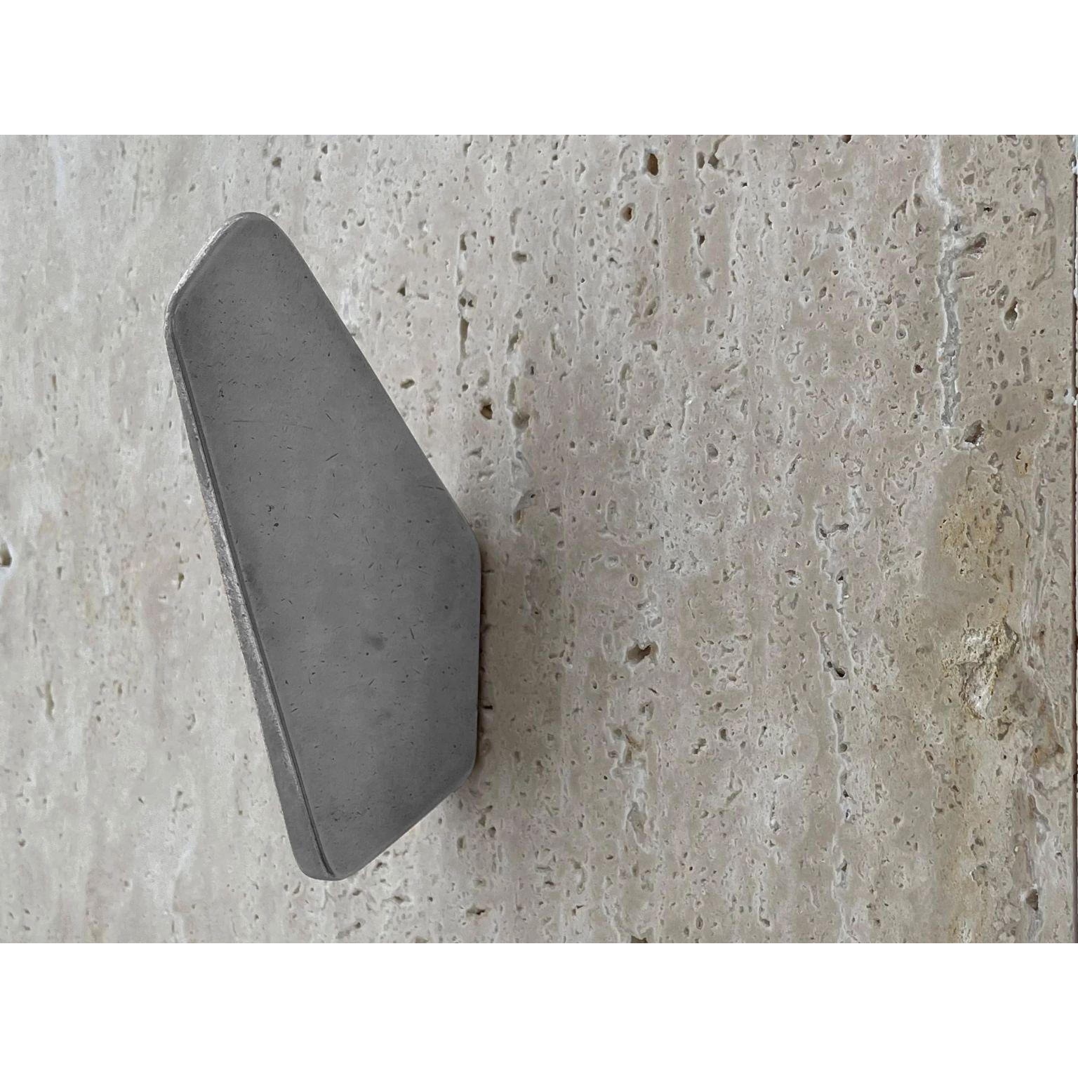 Aluminium Gio Hook by Henry Wilson
Dimensions: W 2 x D 8 x H 12 cm
Materials: Aluminium 

The Gio Hook is sand cast in Aluminium. Named after Signor Ponti, forever an inspiration.
Our Hooks are manufactured in small batches so slight variations will