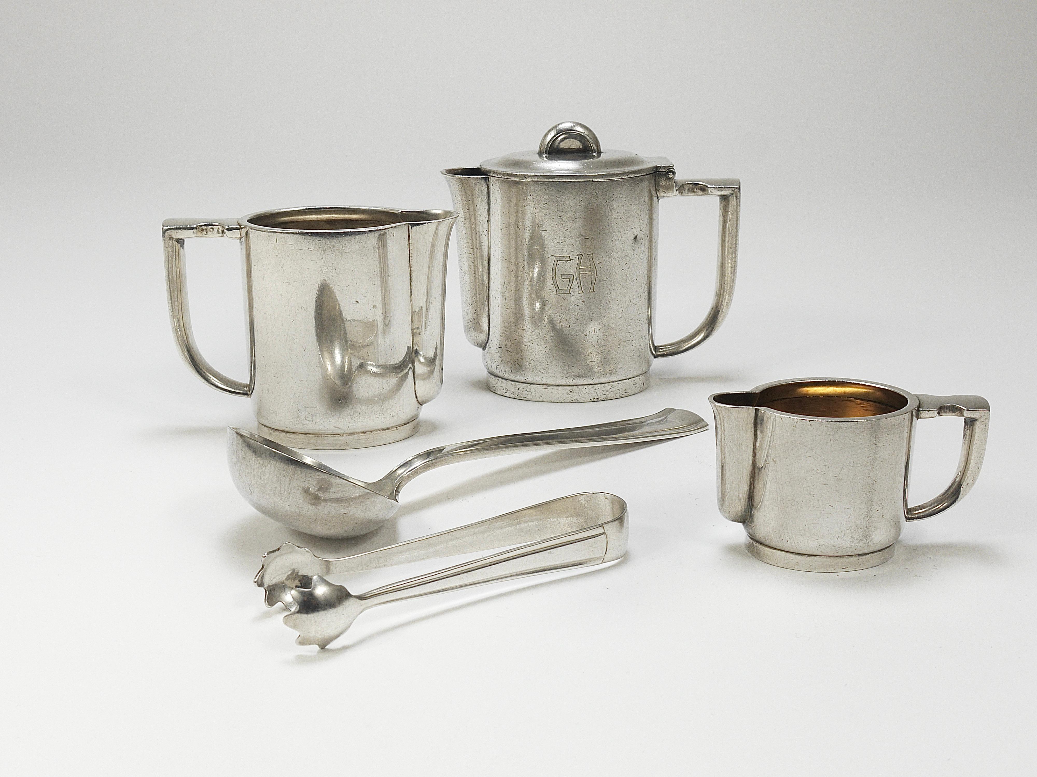 An Elegant Art Deco tableware collection , designed by Gio Ponti for Arthur Krupp and crafted in the 1930s by Krupp Berndorf in Austria. The collection includes 
a tea or coffee pot (20 cl)
a milk jug / cream pitcher (15cl) 
small jug (5cl) for