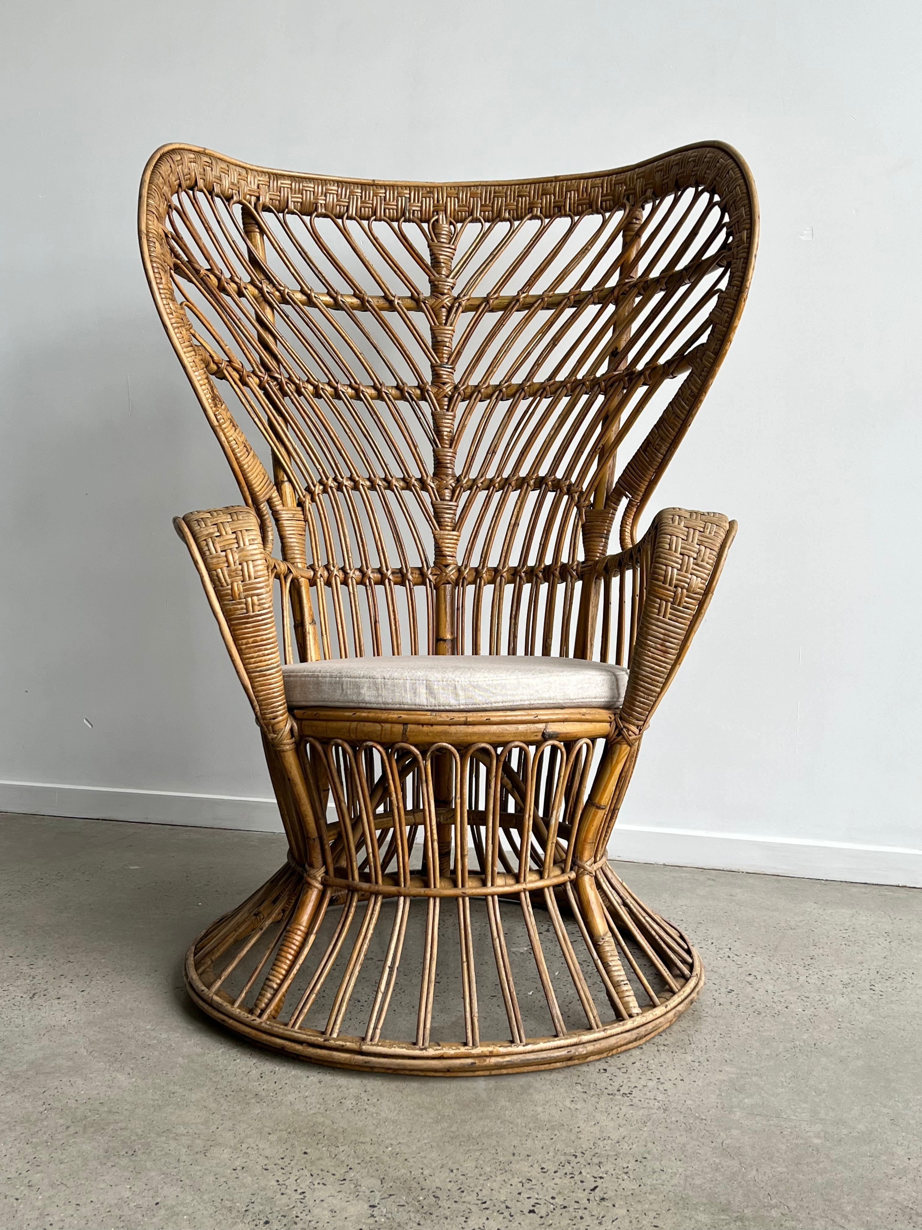 Wicker chair designed by Lio Carminati for Vittorio Bonacina, 1950. Carminati was a student of Gio Ponti. Ponti and Carminati originally designed this chair for the luxury ocean liner Conte Biancamano. This model of a wingback chair was used by