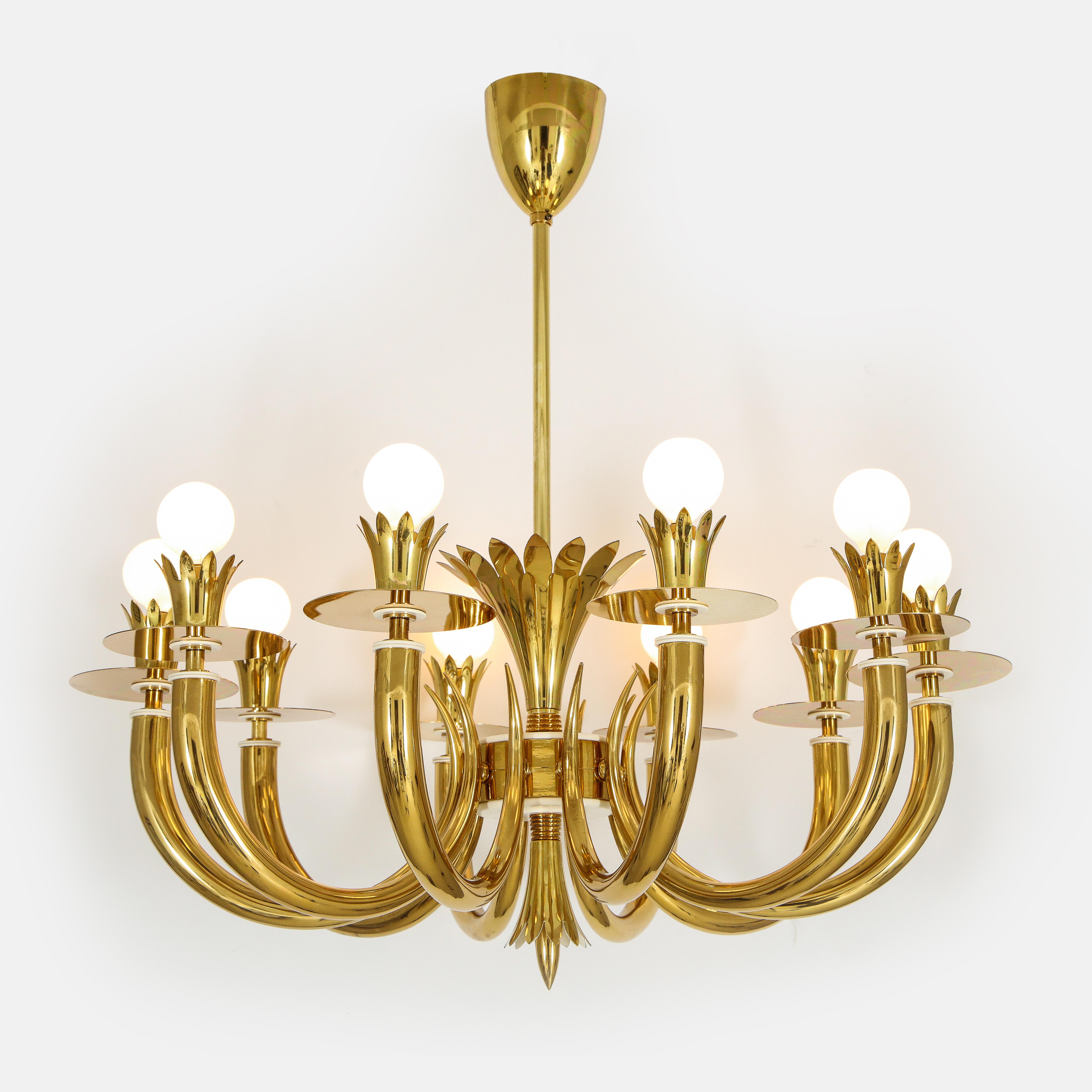 Gio Ponti and Emilio Lancia exquisite rare 10-arm brass chandelier with elegantly draped arms radiating from central foliate motif and ending in foliate cups with subtle white lacquered details throughout. Classic in Art Deco design yet with playful