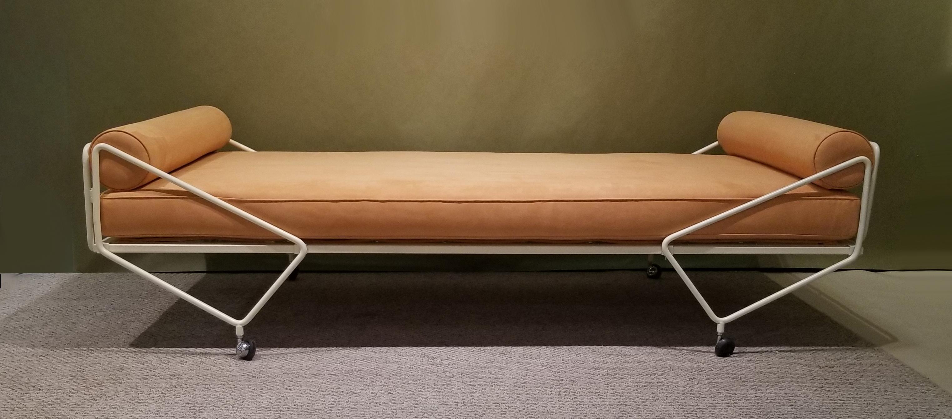 Includes a “Certificate of Authenticity” from Lisa Licitra Ponti and the Gio Ponti Archives. This beautiful minimalist daybed was restored in a soft satin crème lacquer and upholstered in a custom ordered ultra-suede. The cushion is hand-stitched so